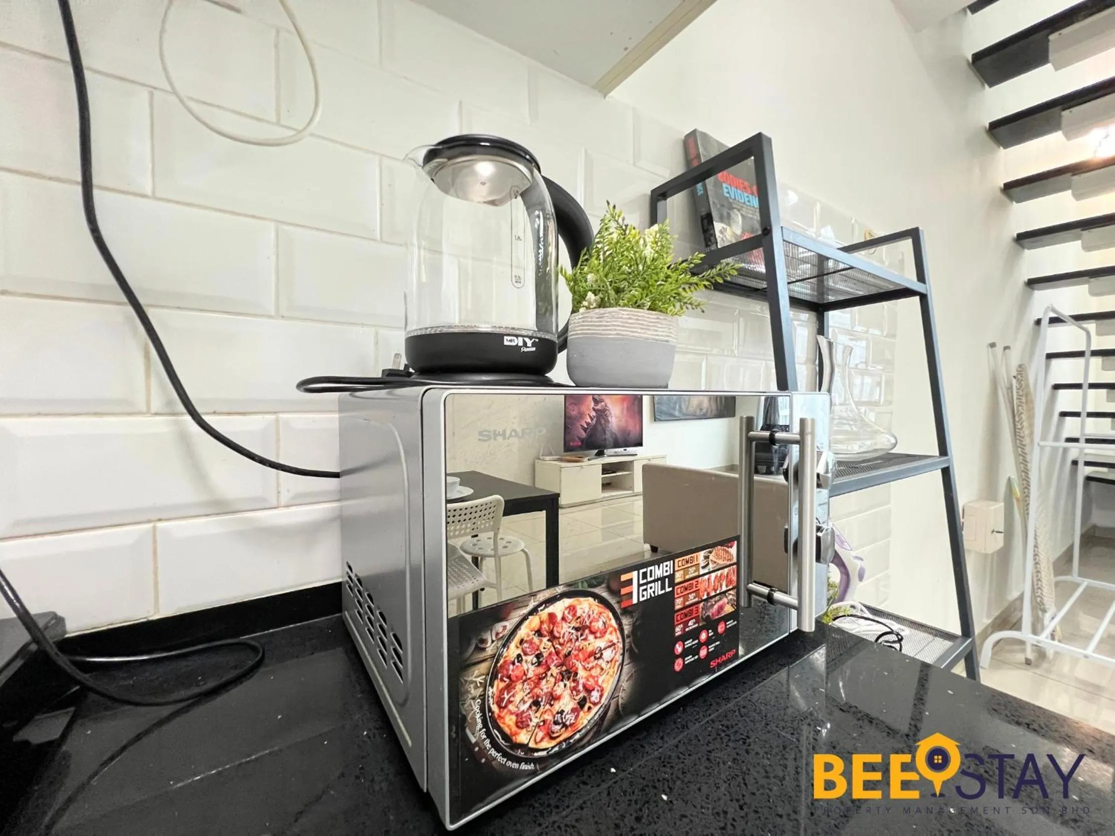 microwave in The Scott Garden Kuala Lumpur by BeeStay Management