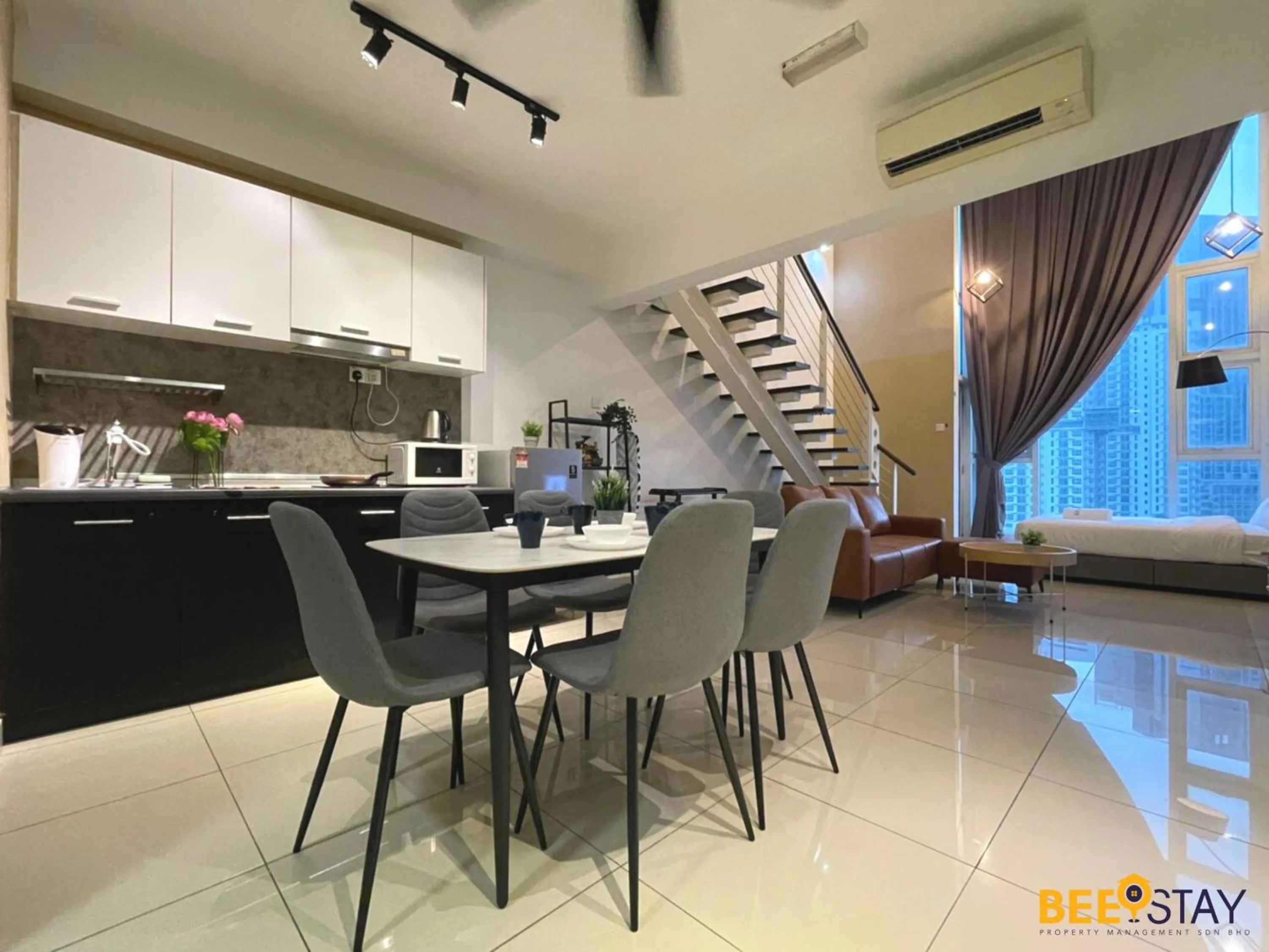 Living room in The Scott Garden Kuala Lumpur by BeeStay Management