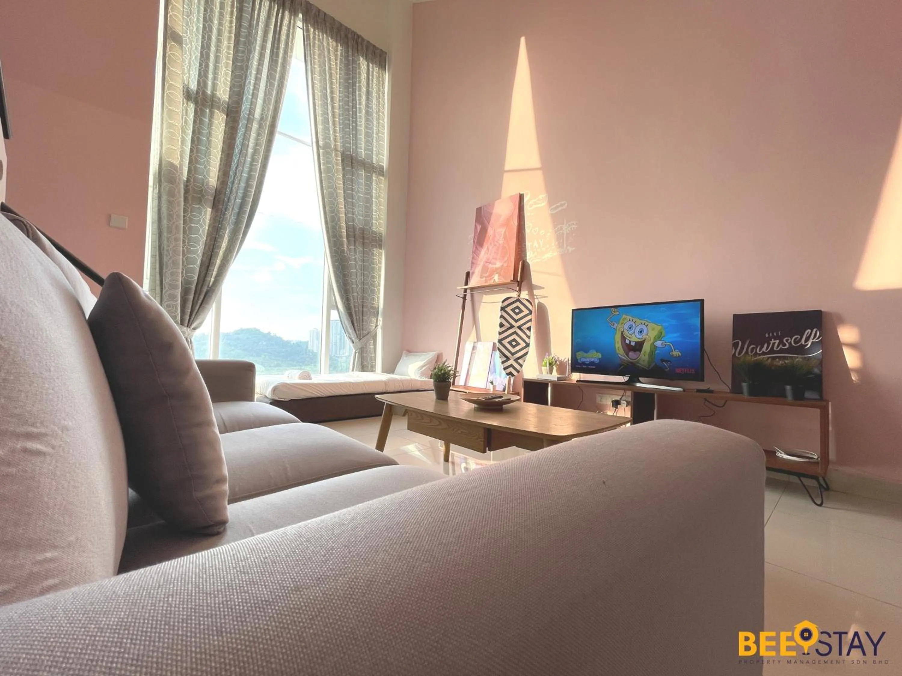 Living room in The Scott Garden Kuala Lumpur by BeeStay Management