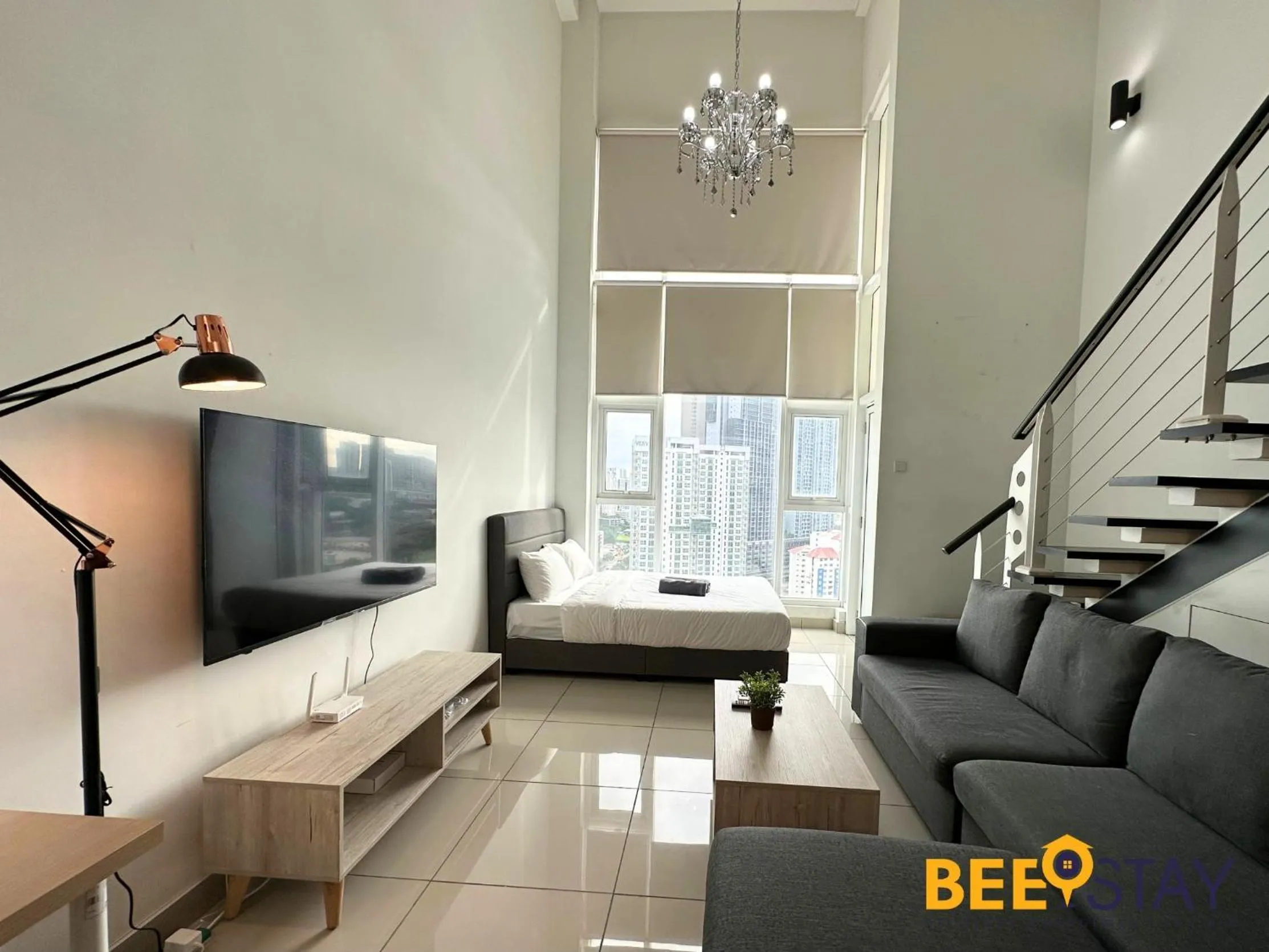 Living room in The Scott Garden Kuala Lumpur by BeeStay Management
