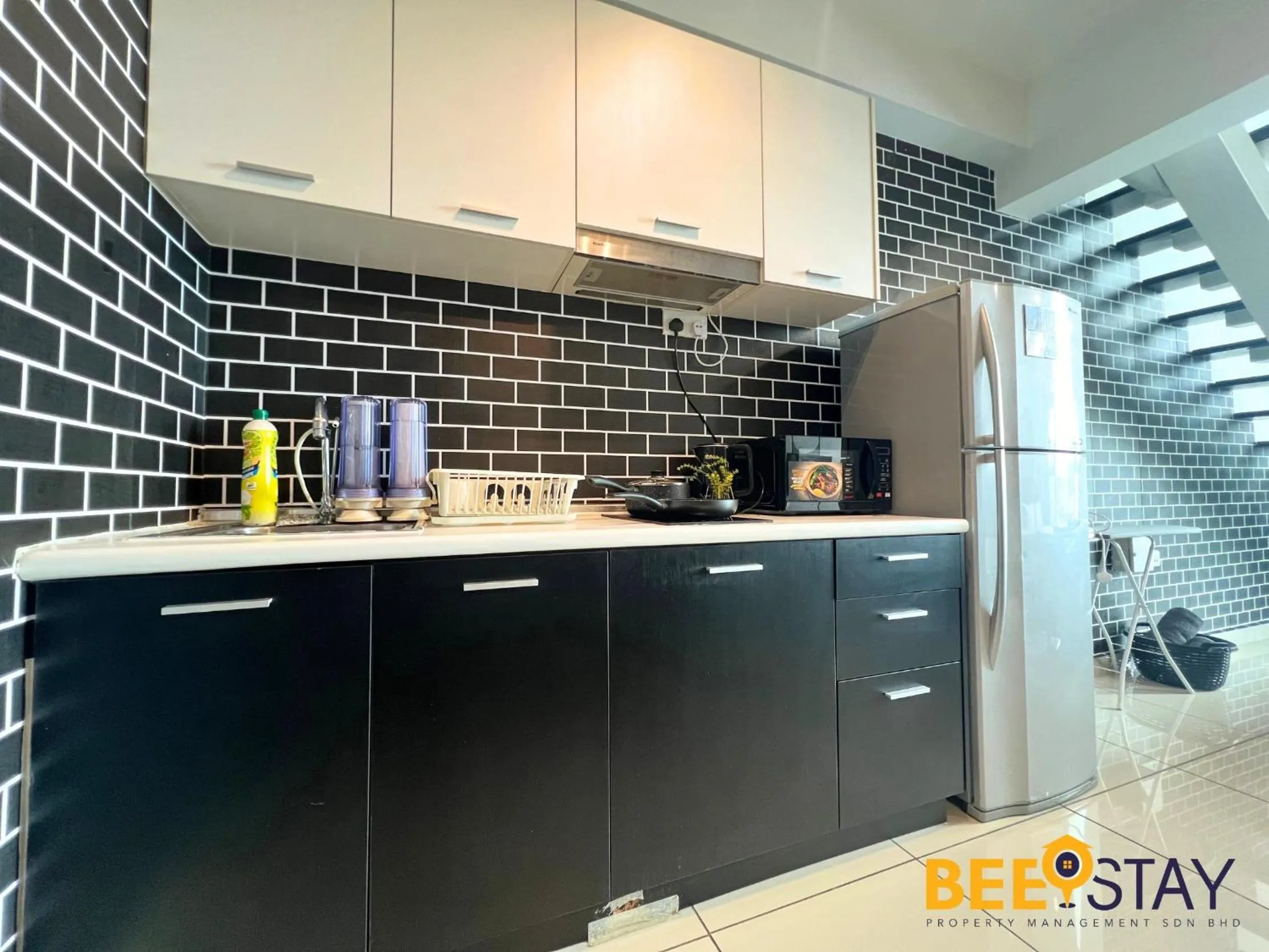 Kitchen or kitchenette in The Scott Garden Kuala Lumpur by BeeStay Management