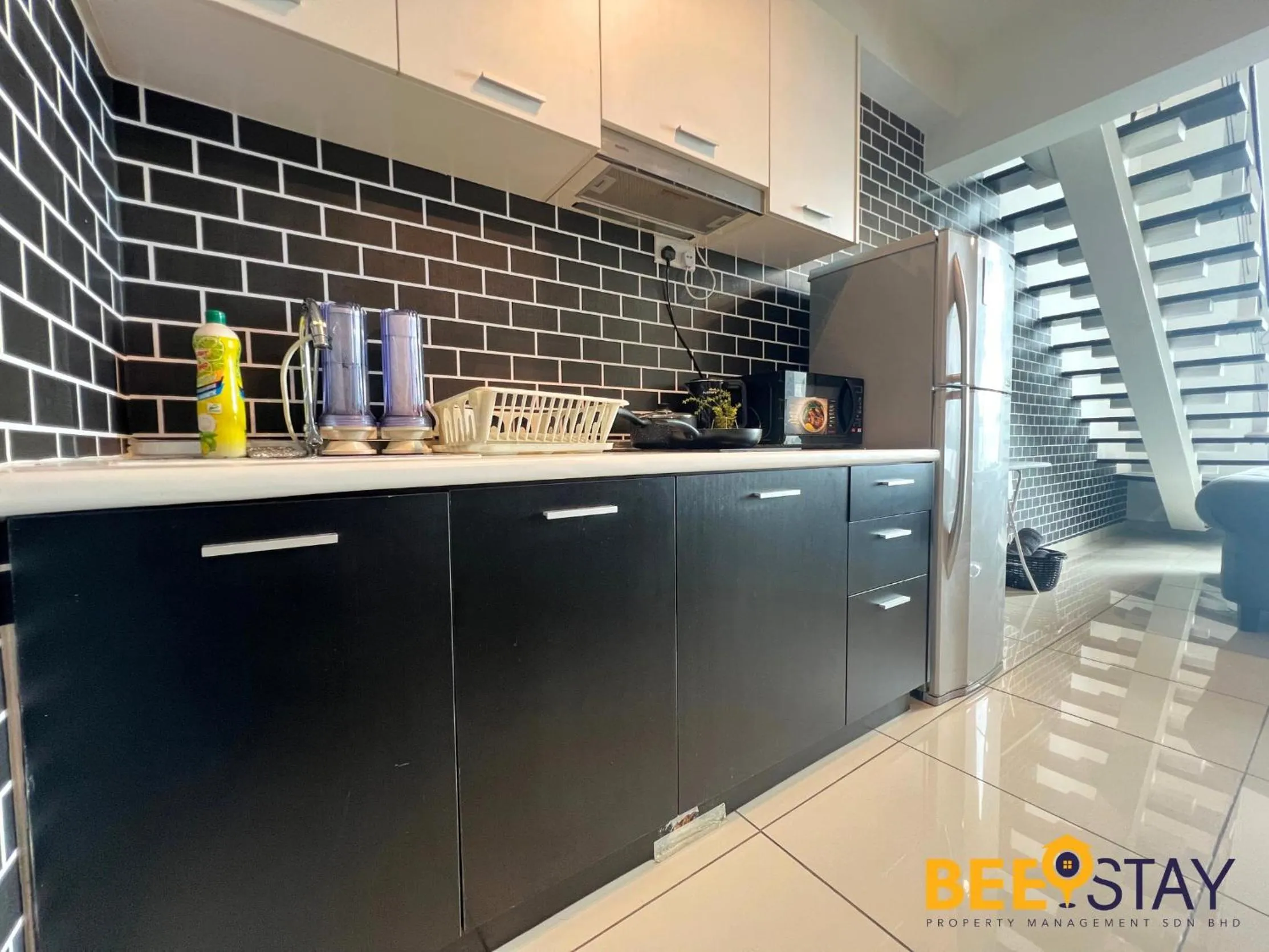 Kitchen or kitchenette in The Scott Garden Kuala Lumpur by BeeStay Management