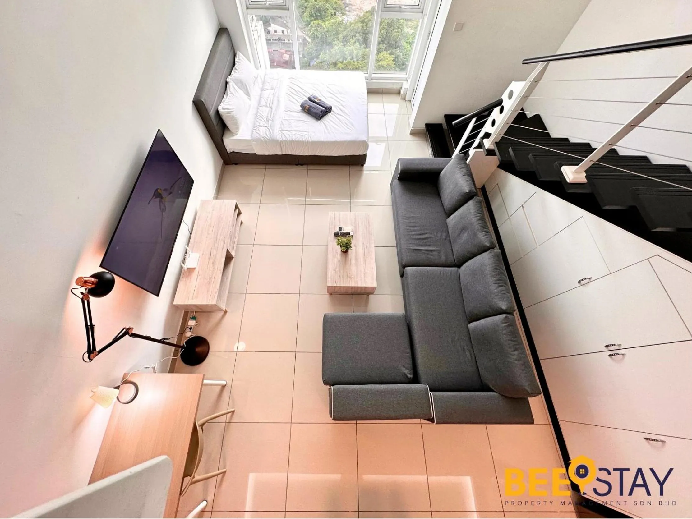 Living room in The Scott Garden Kuala Lumpur by BeeStay Management