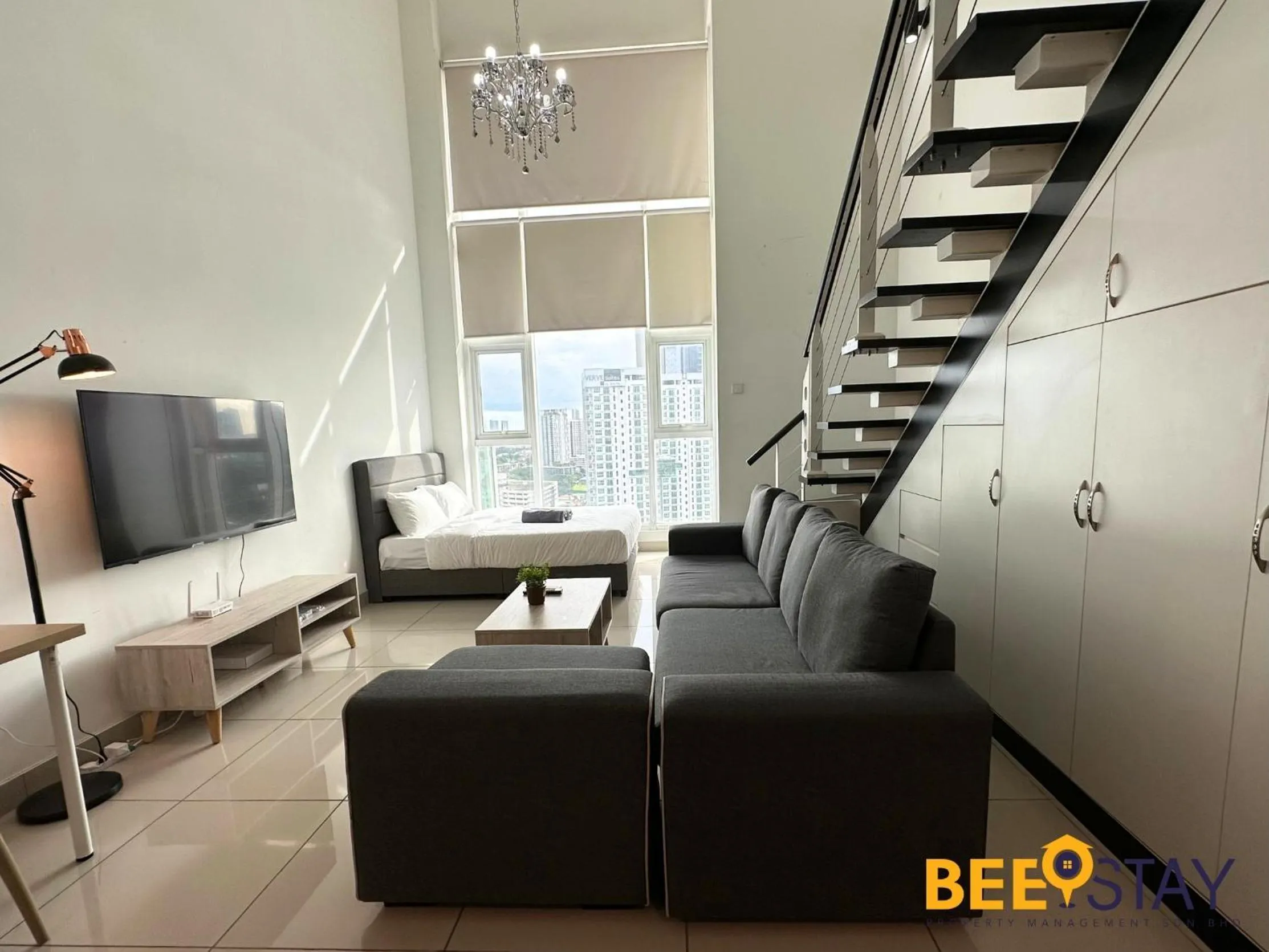 Living room in The Scott Garden Kuala Lumpur by BeeStay Management