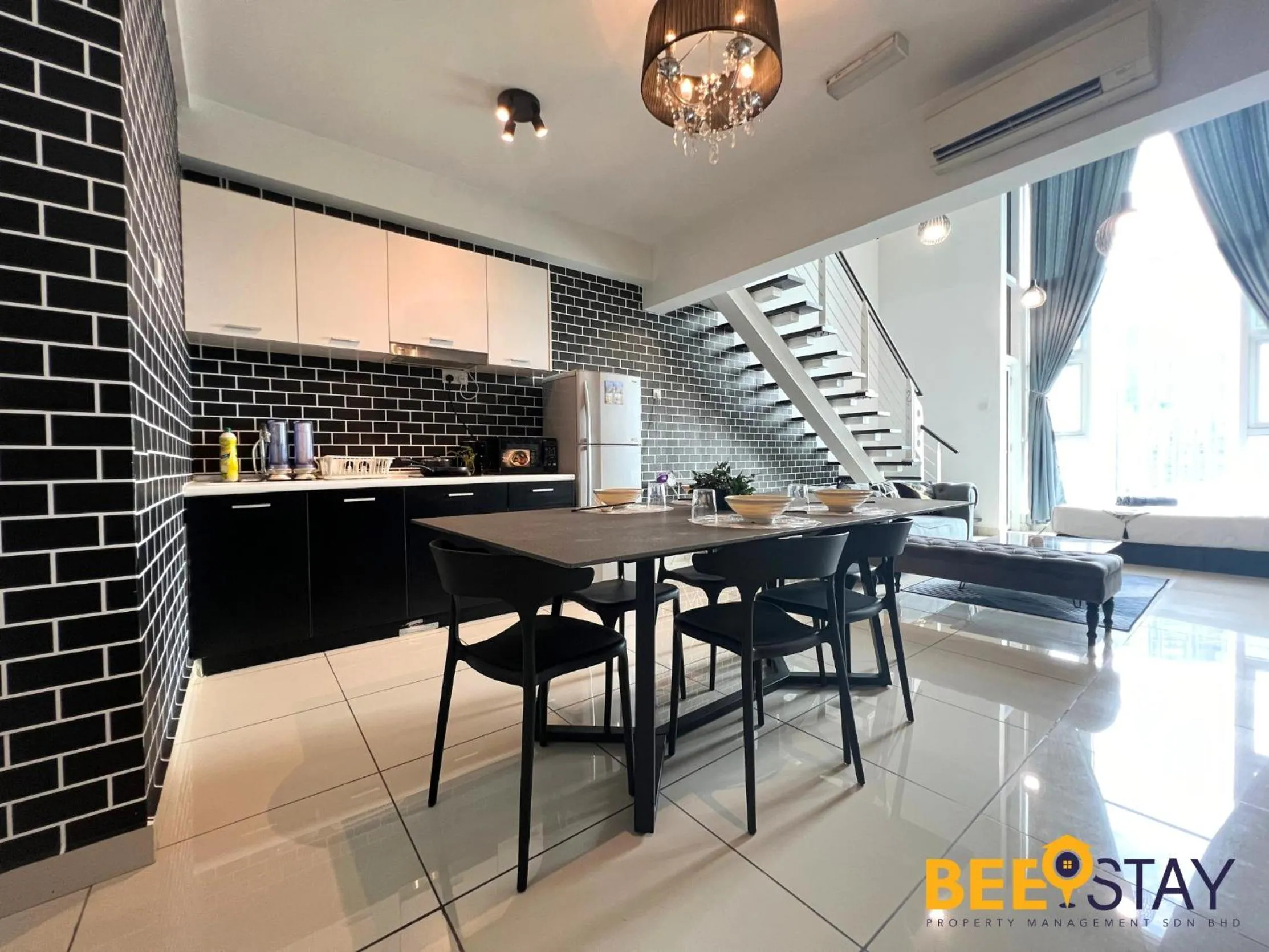 Dining area in The Scott Garden Kuala Lumpur by BeeStay Management