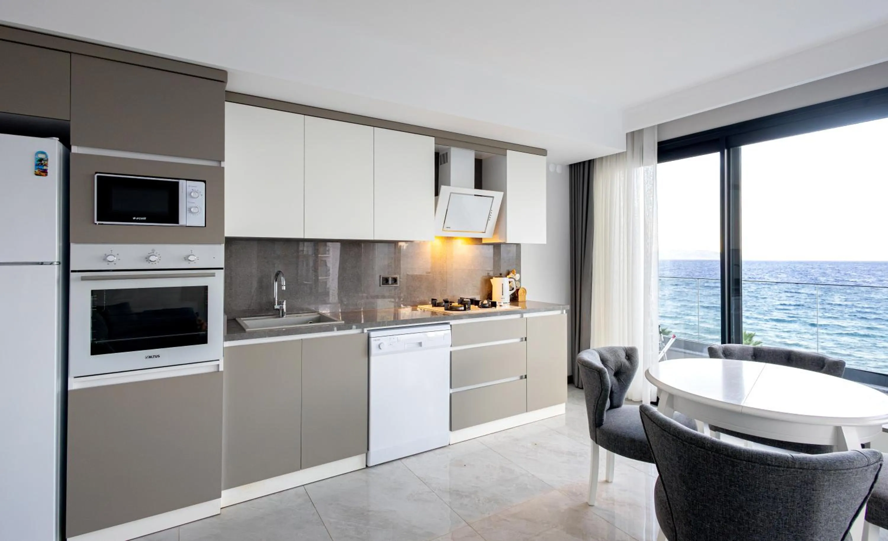 Kitchen or kitchenette in Artan Suites Tatil Evleri