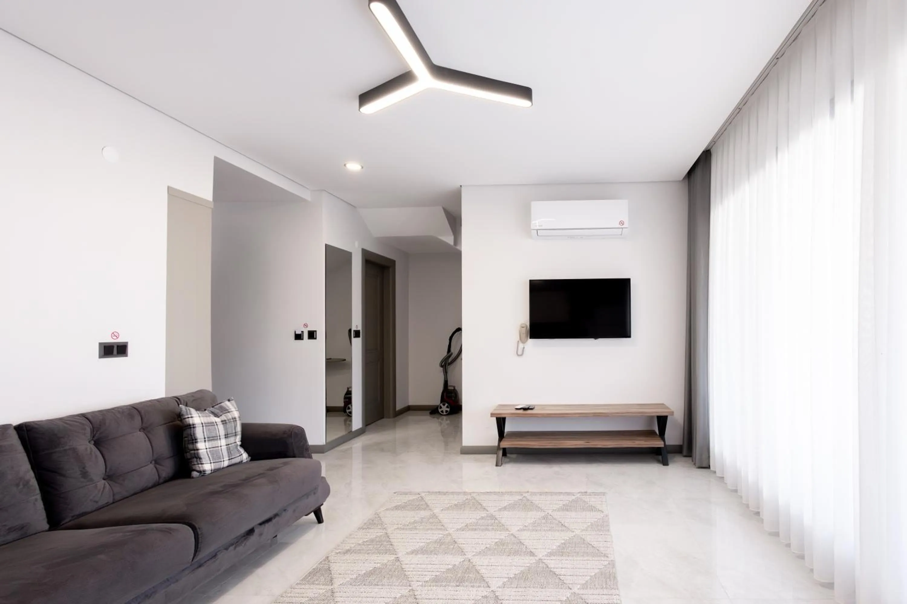 Seating area, Bed in Artan Suites Tatil Evleri