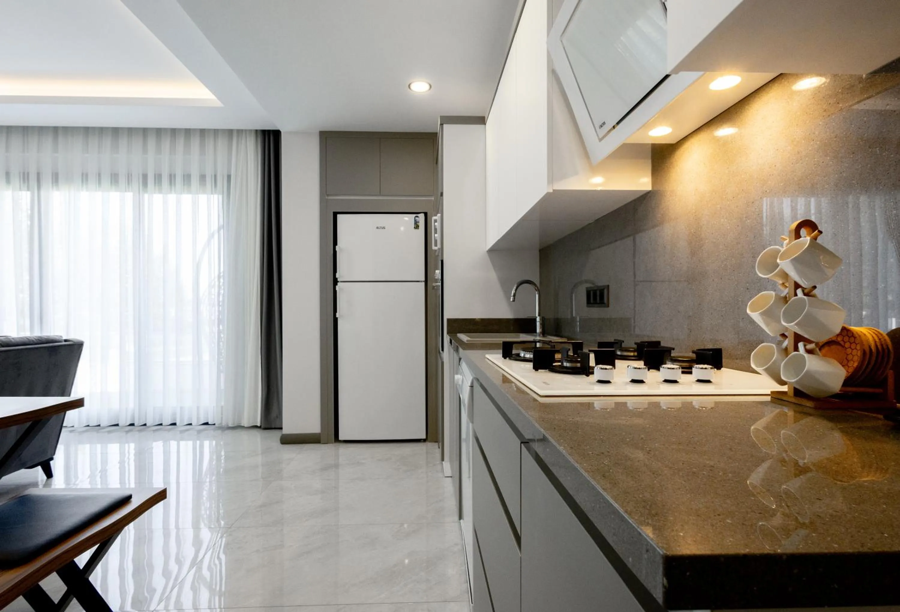 Kitchen or kitchenette in Artan Suites Tatil Evleri