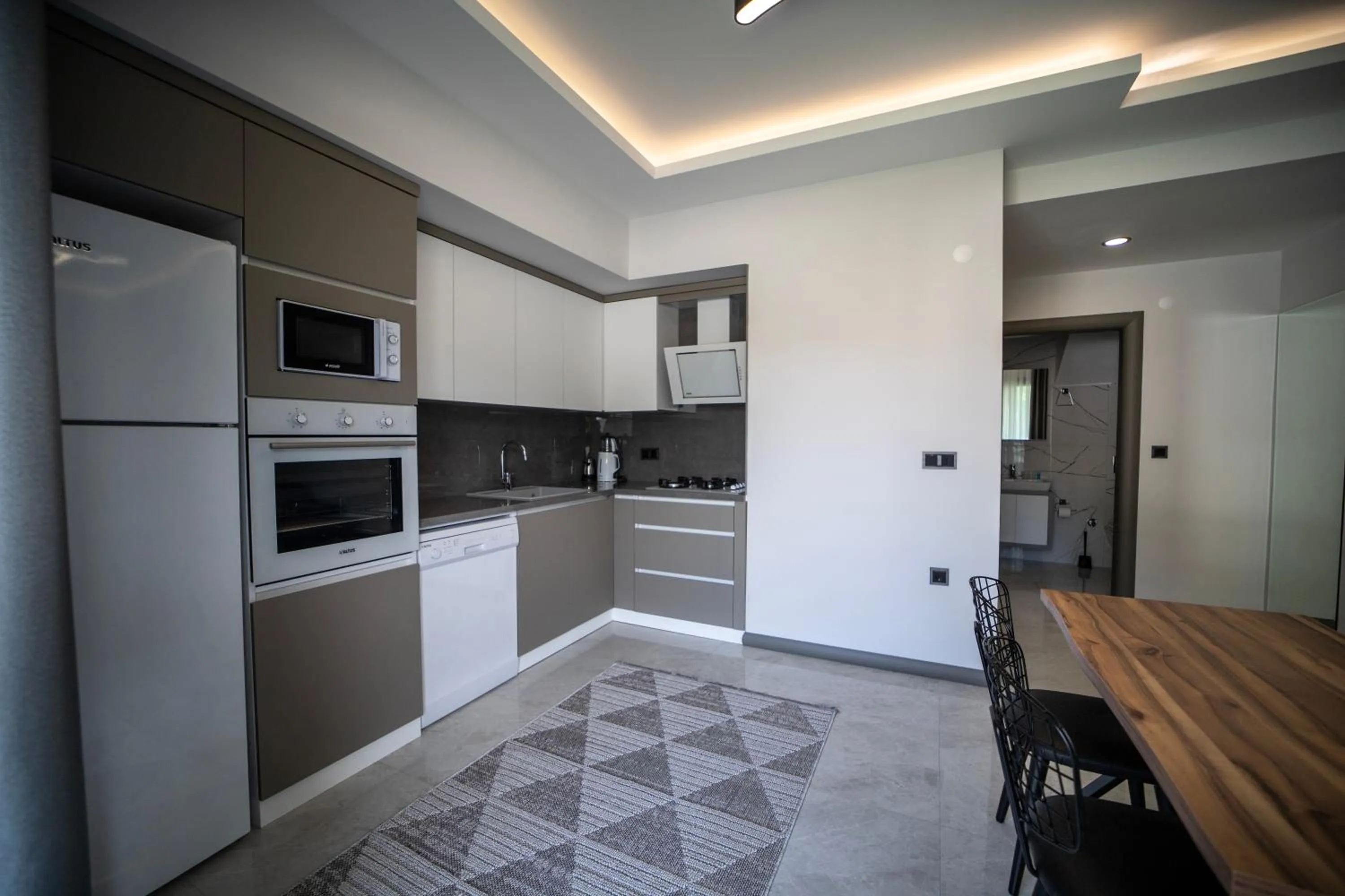 Kitchen or kitchenette in Artan Suites Tatil Evleri