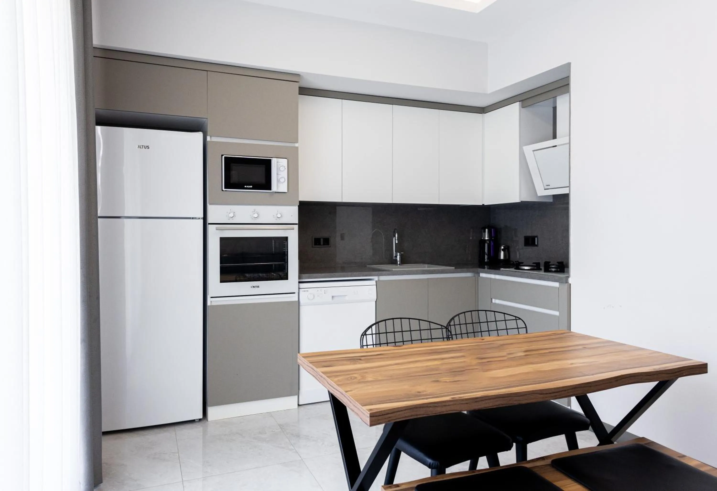 Kitchen or kitchenette in Artan Suites Tatil Evleri