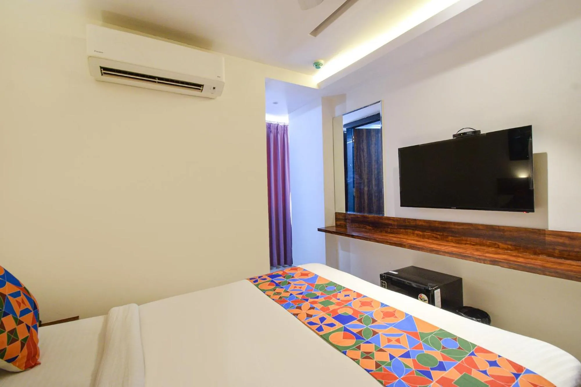 Bed in FabHotel Prime Prowell Apex