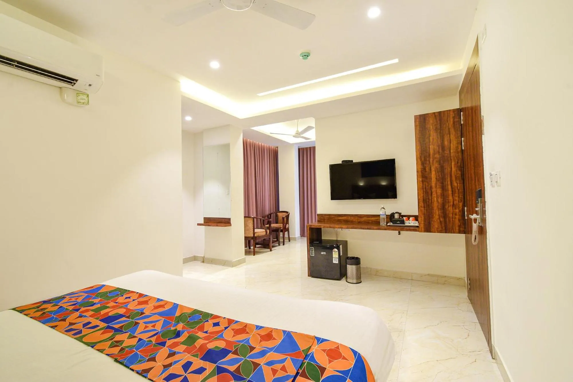 Bed in FabHotel Prime Prowell Apex