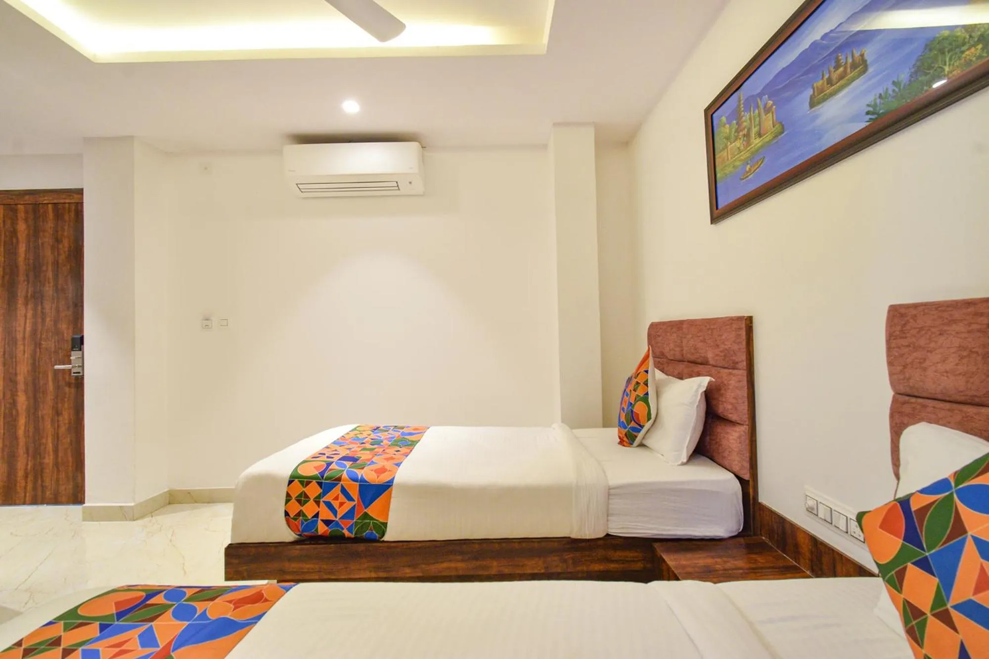 Bed in FabHotel Prime Prowell Apex