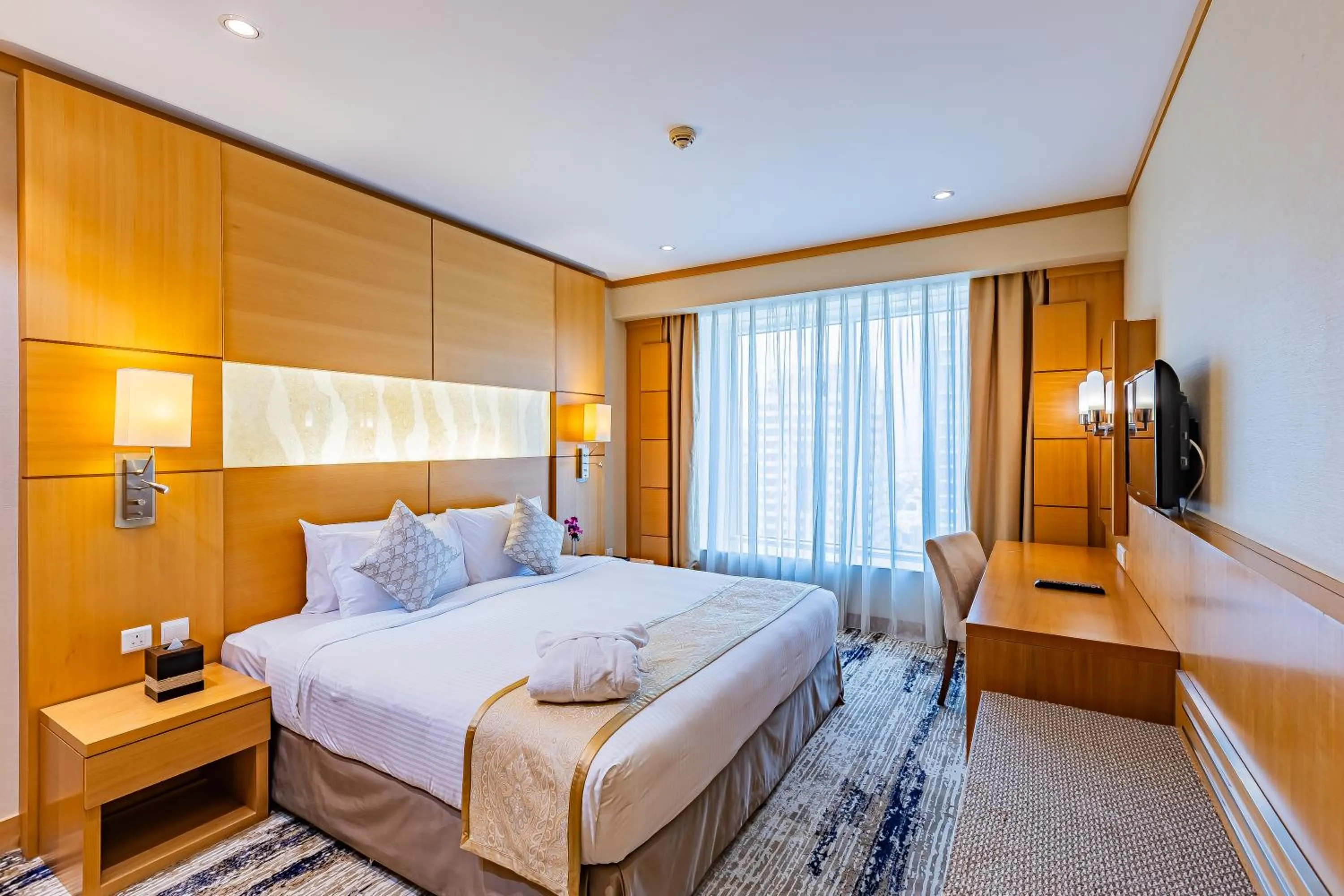 Bed in Carlton Downtown Hotel