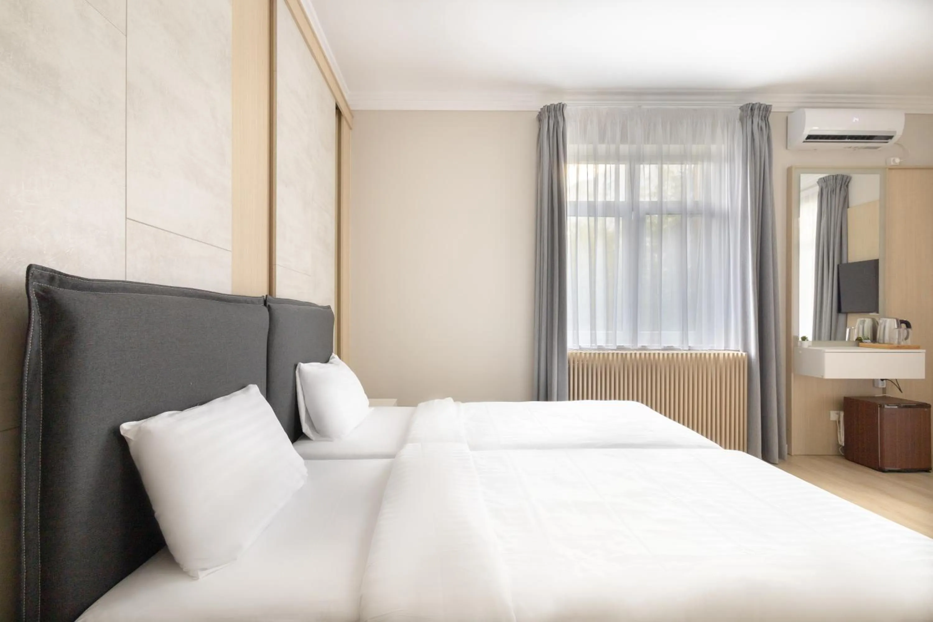 Bed in Piccolo Mondo by CityBookings