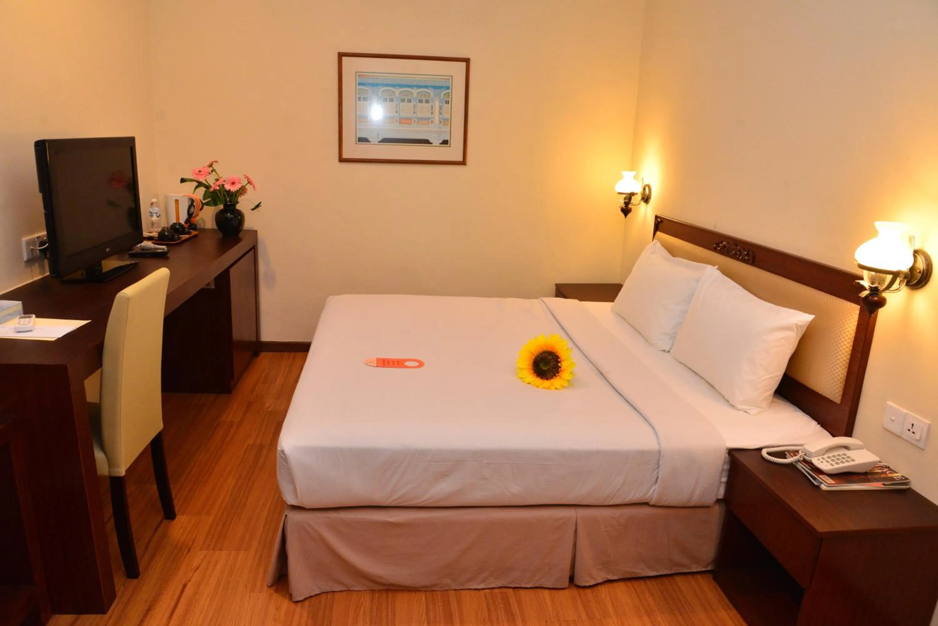 Bed in Cheng Ho Hotel