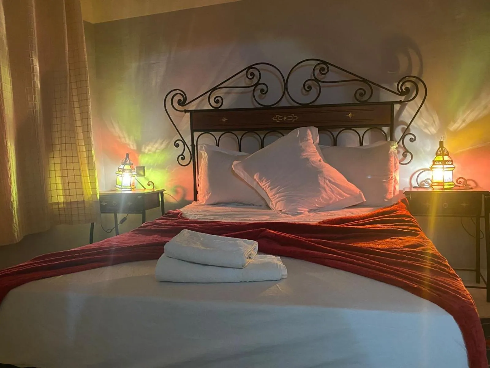 Bed in APPART AIGLE HOTEL