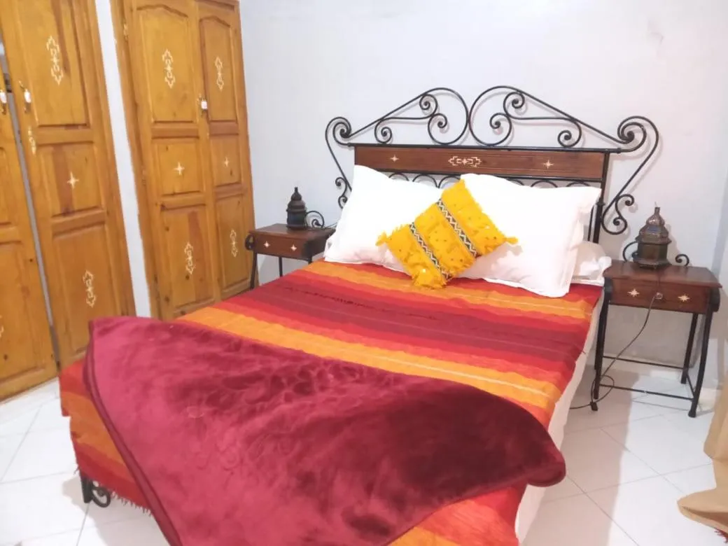 Bed in APPART AIGLE HOTEL