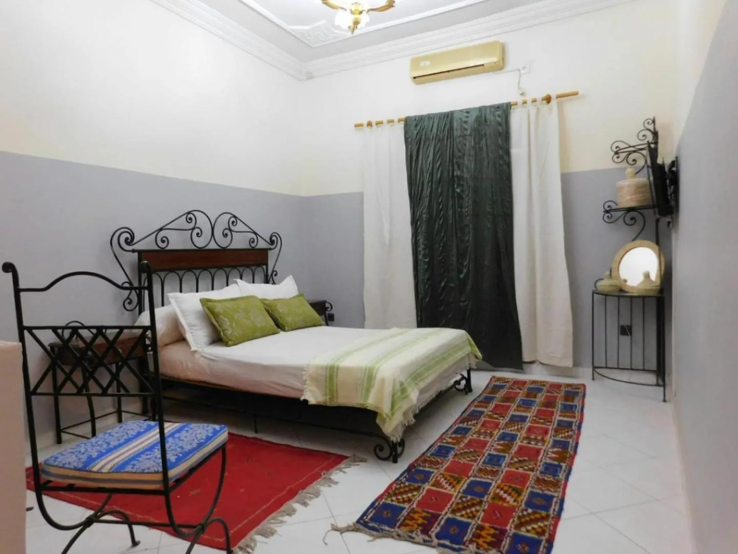 Bed in APPART AIGLE HOTEL