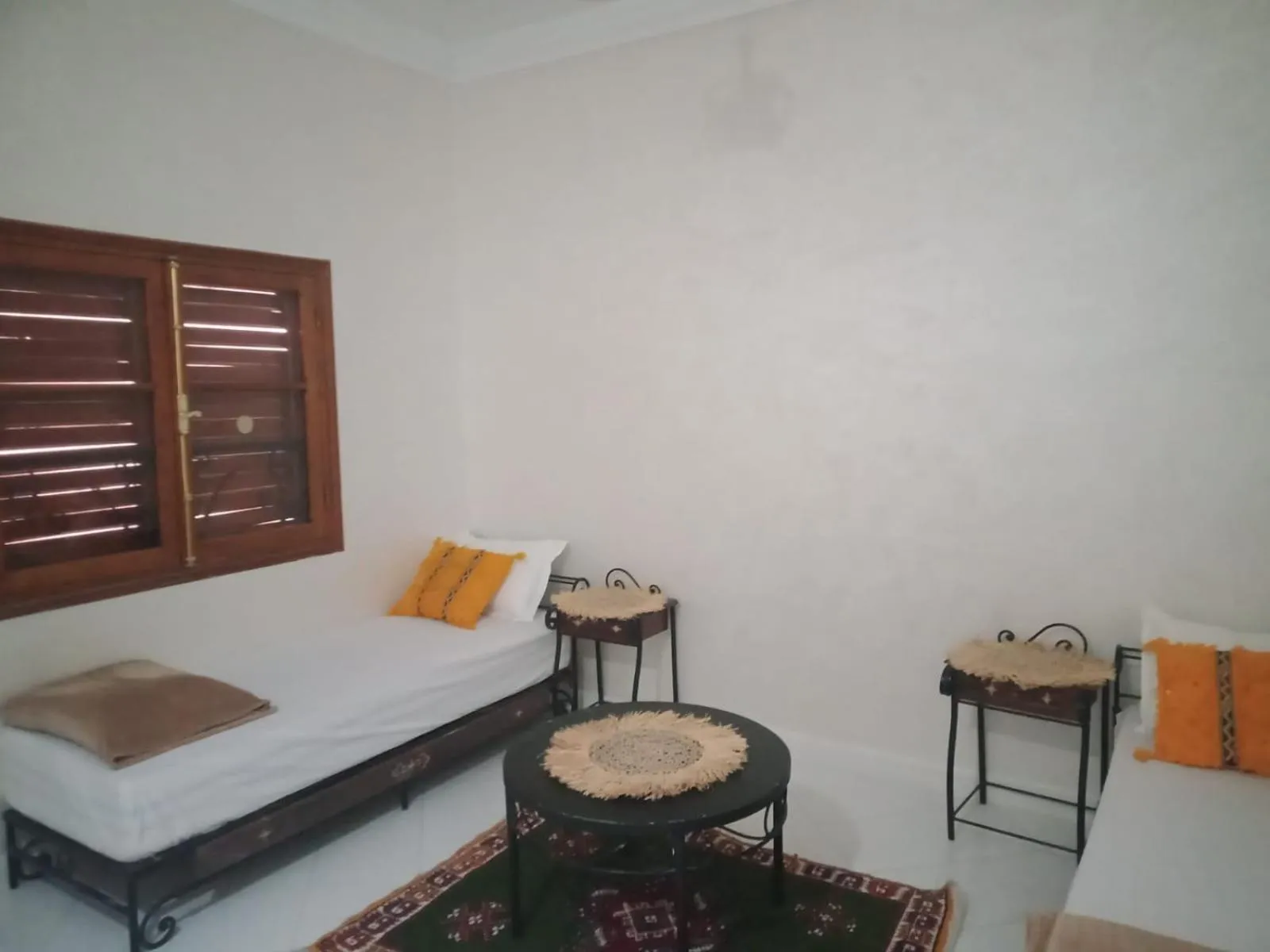 Bed in APPART AIGLE HOTEL