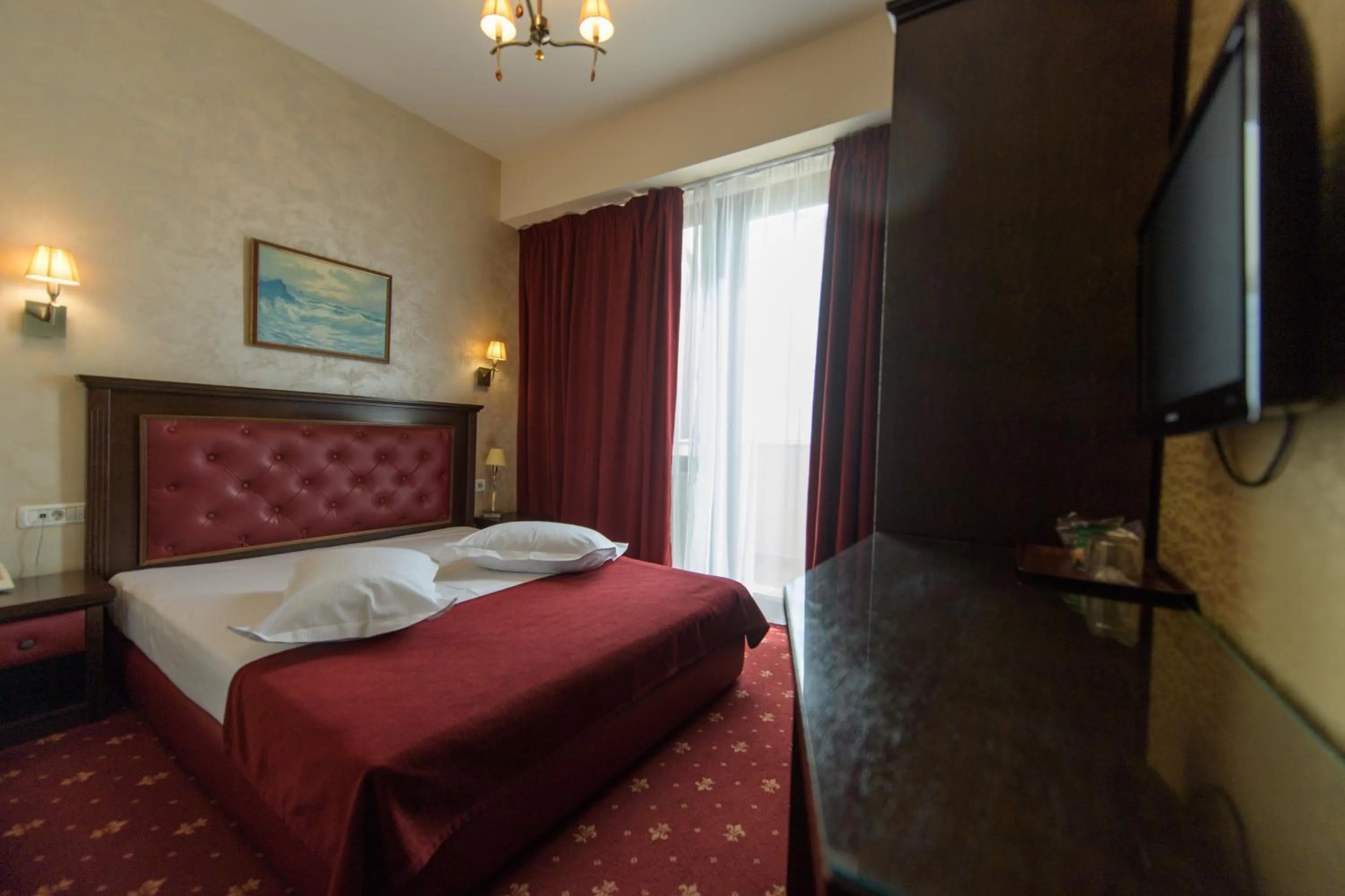 Bed in Hotel Golden Palace