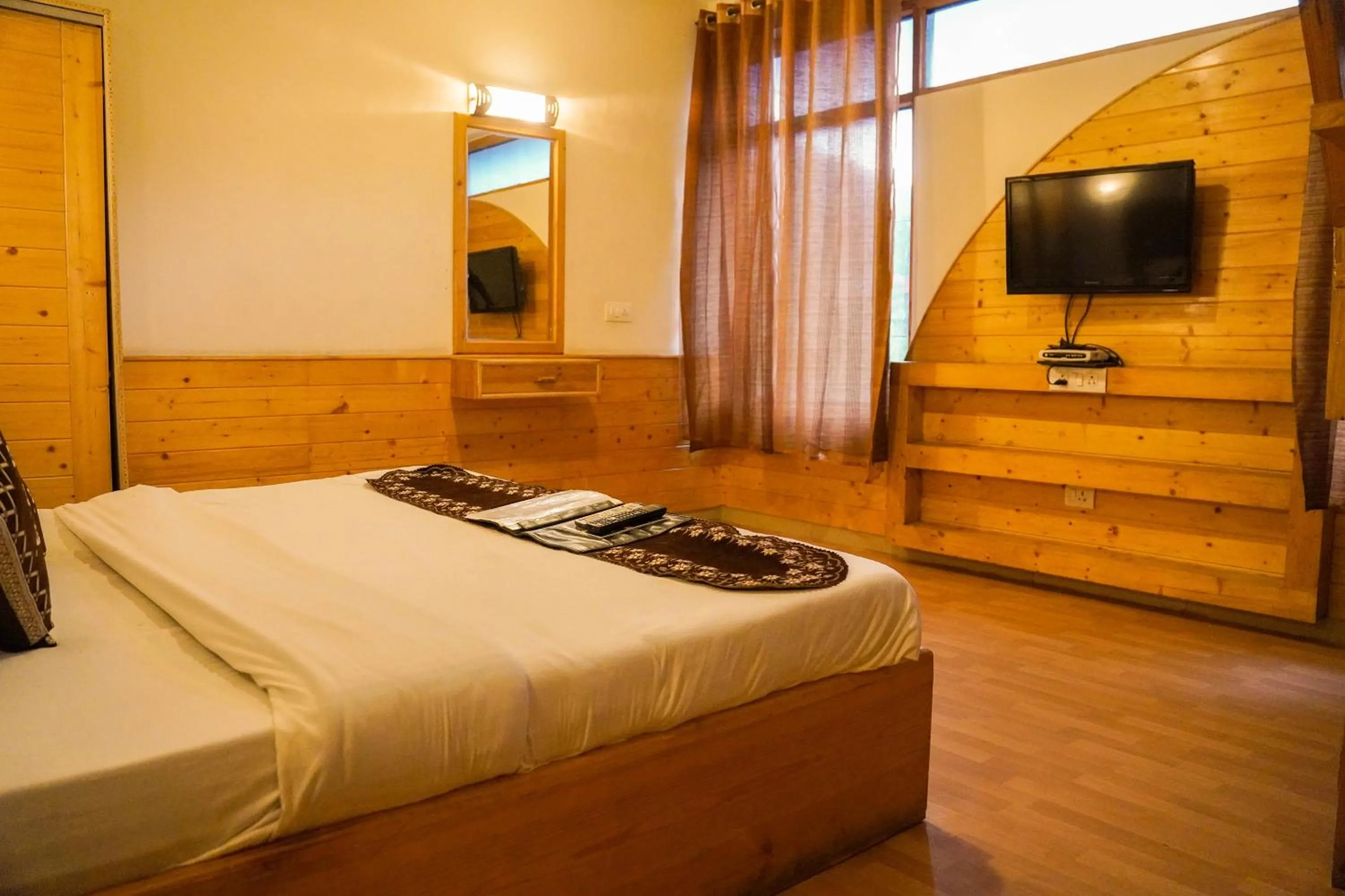 TV and multimedia in Ride At Hill-Nihal Hotel & Cottage