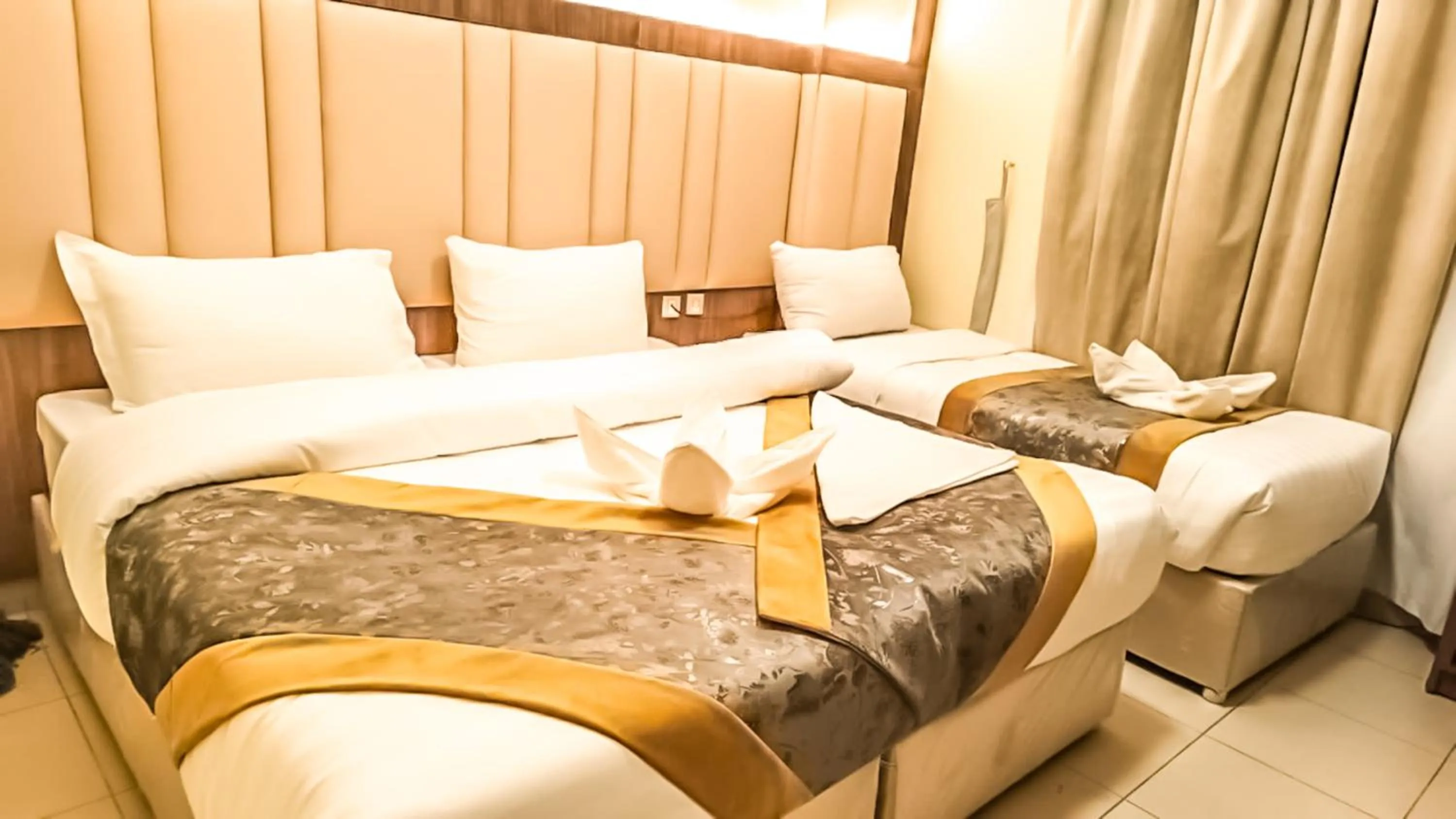 Bed in Diyafa Al Mukhtara Hotel
