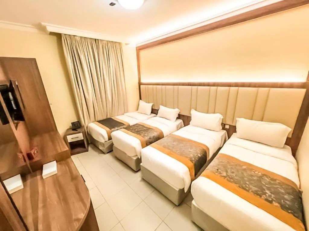 Bed in Diyafa Al Mukhtara Hotel