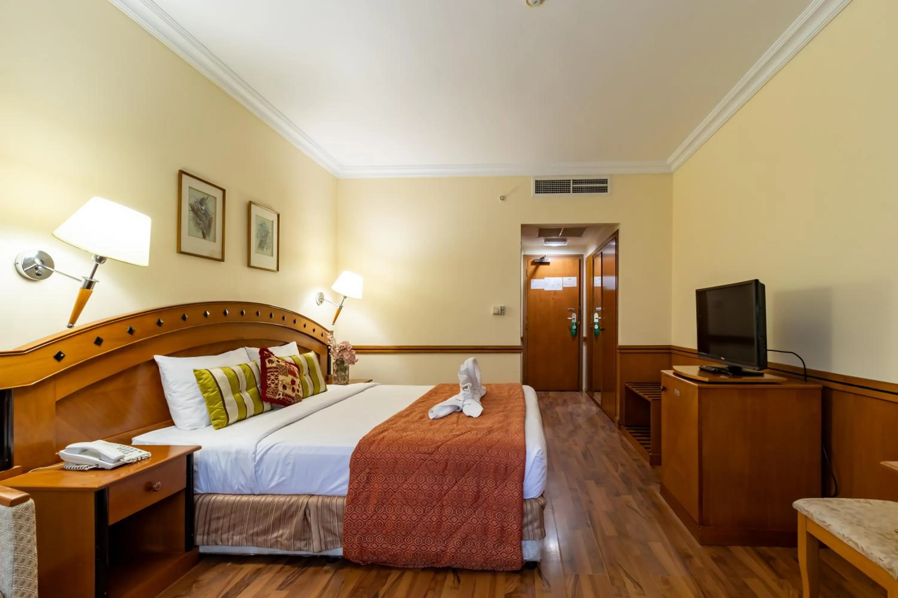 Bed in City Palace Hotel