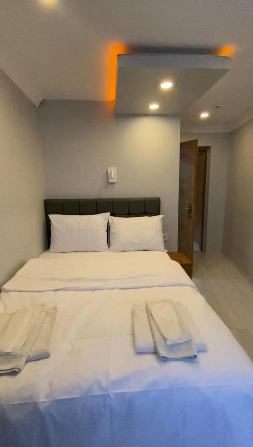 Bed in Riverland Suites Apart Hotel