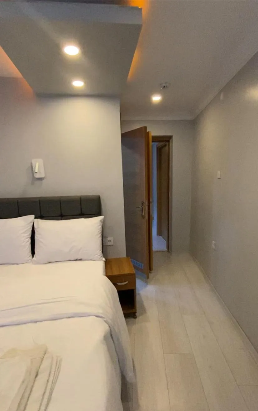 Bed in Riverland Suites Apart Hotel