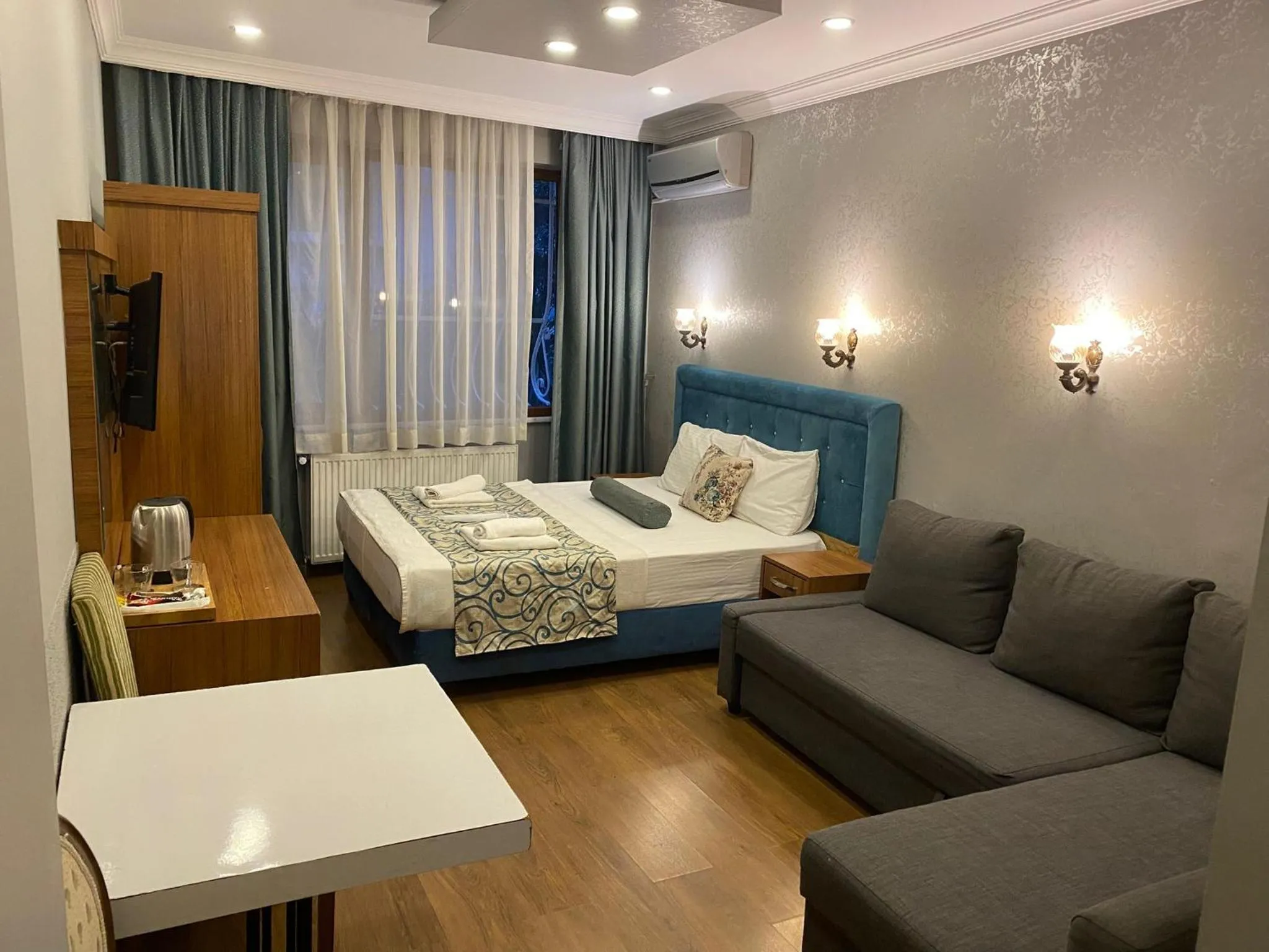 Bed in Riverland Suites Apart Hotel