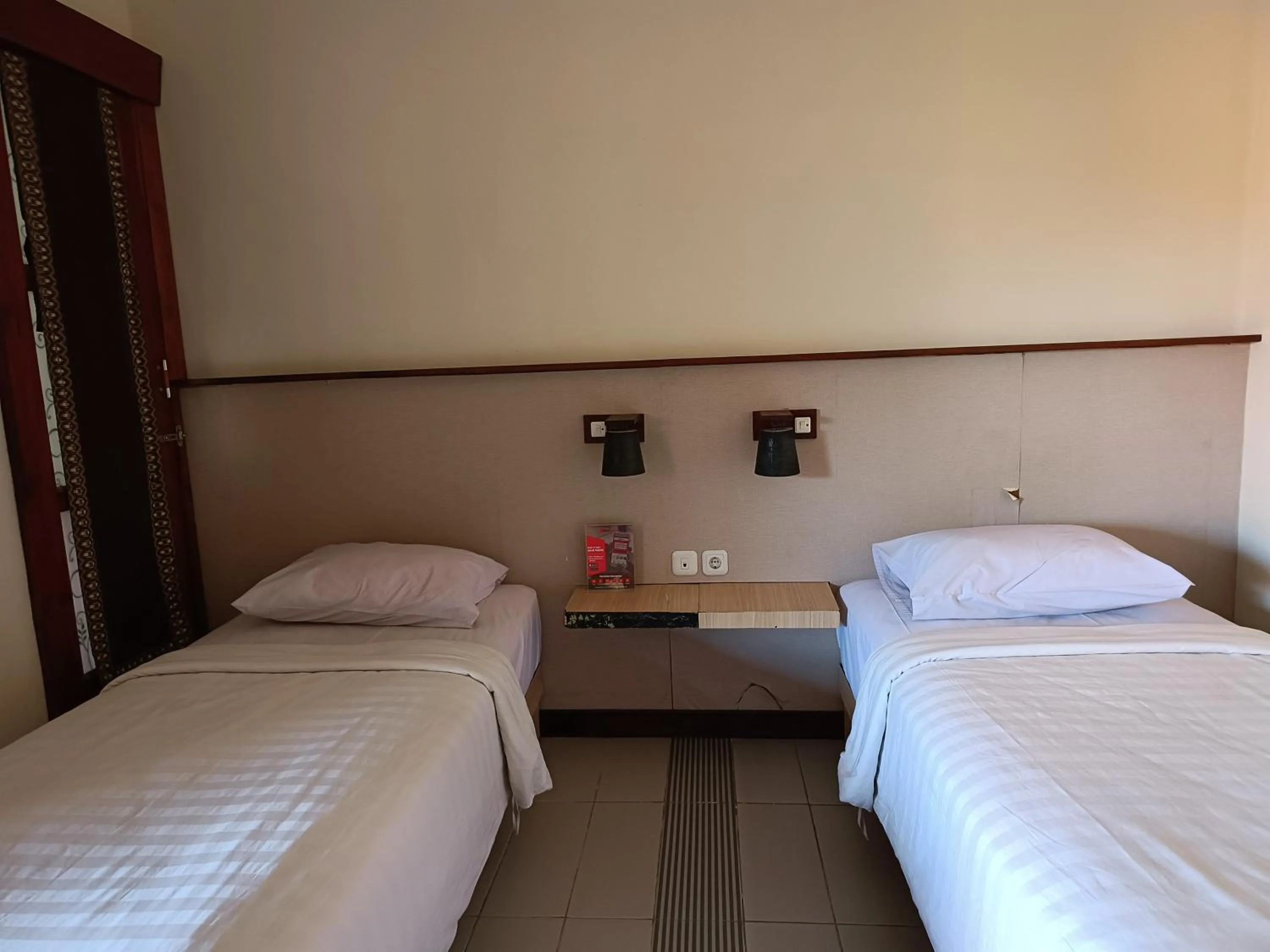 Bed in Keola Hotel Legian
