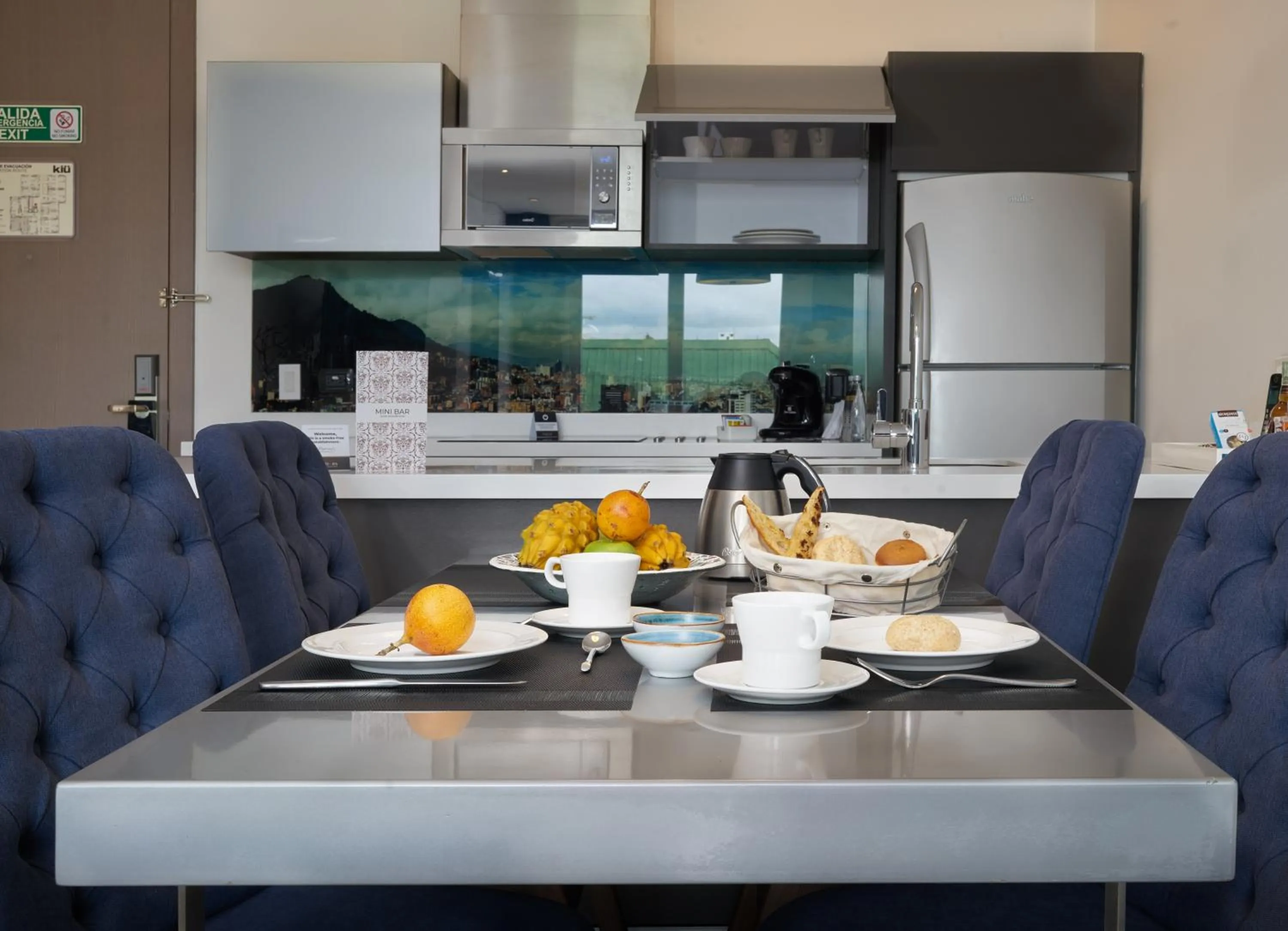 Kitchen or kitchenette in Hotel 100 Luxury Suites by Preferred