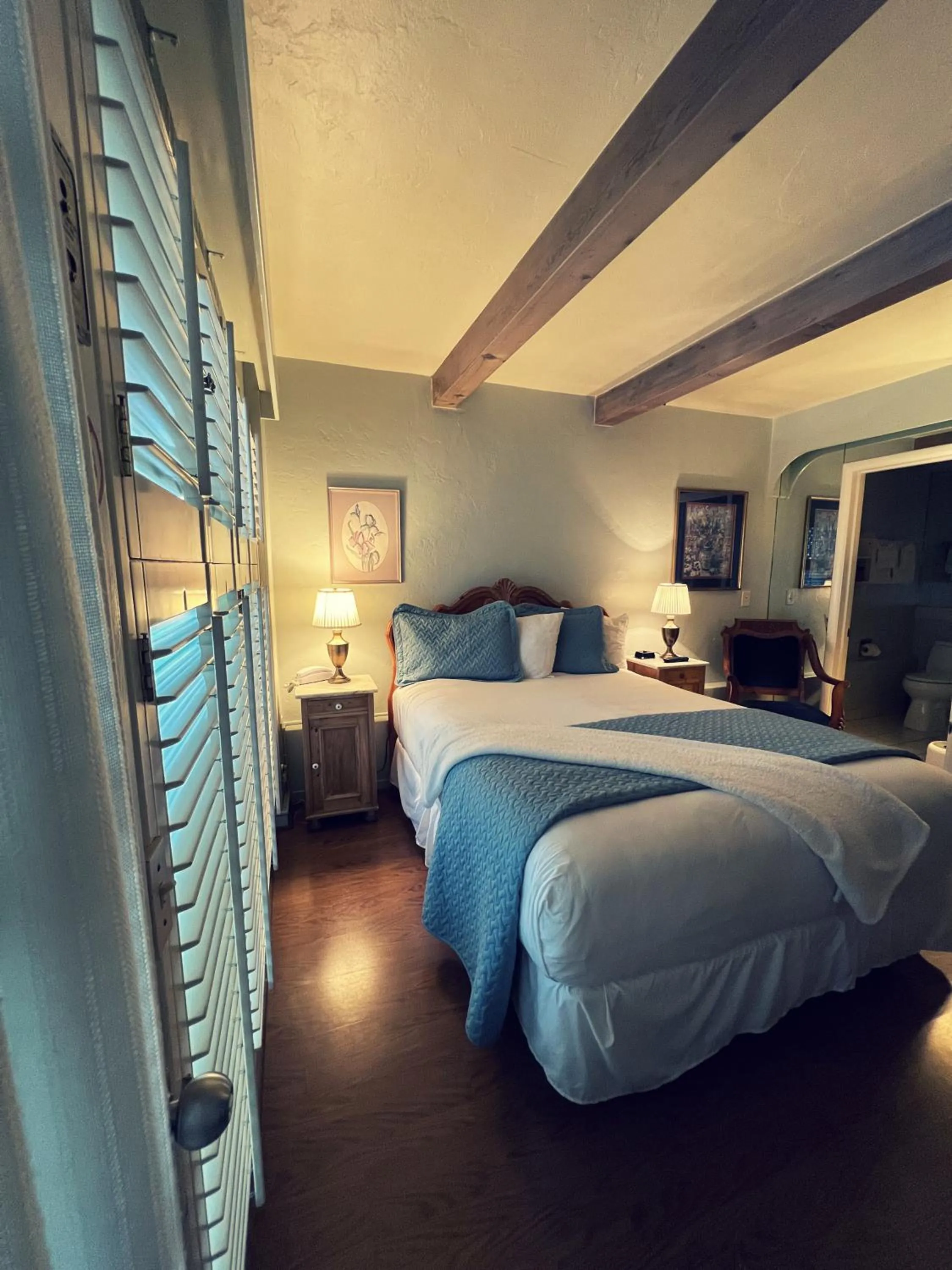 Bed in Carmel Garden Inn