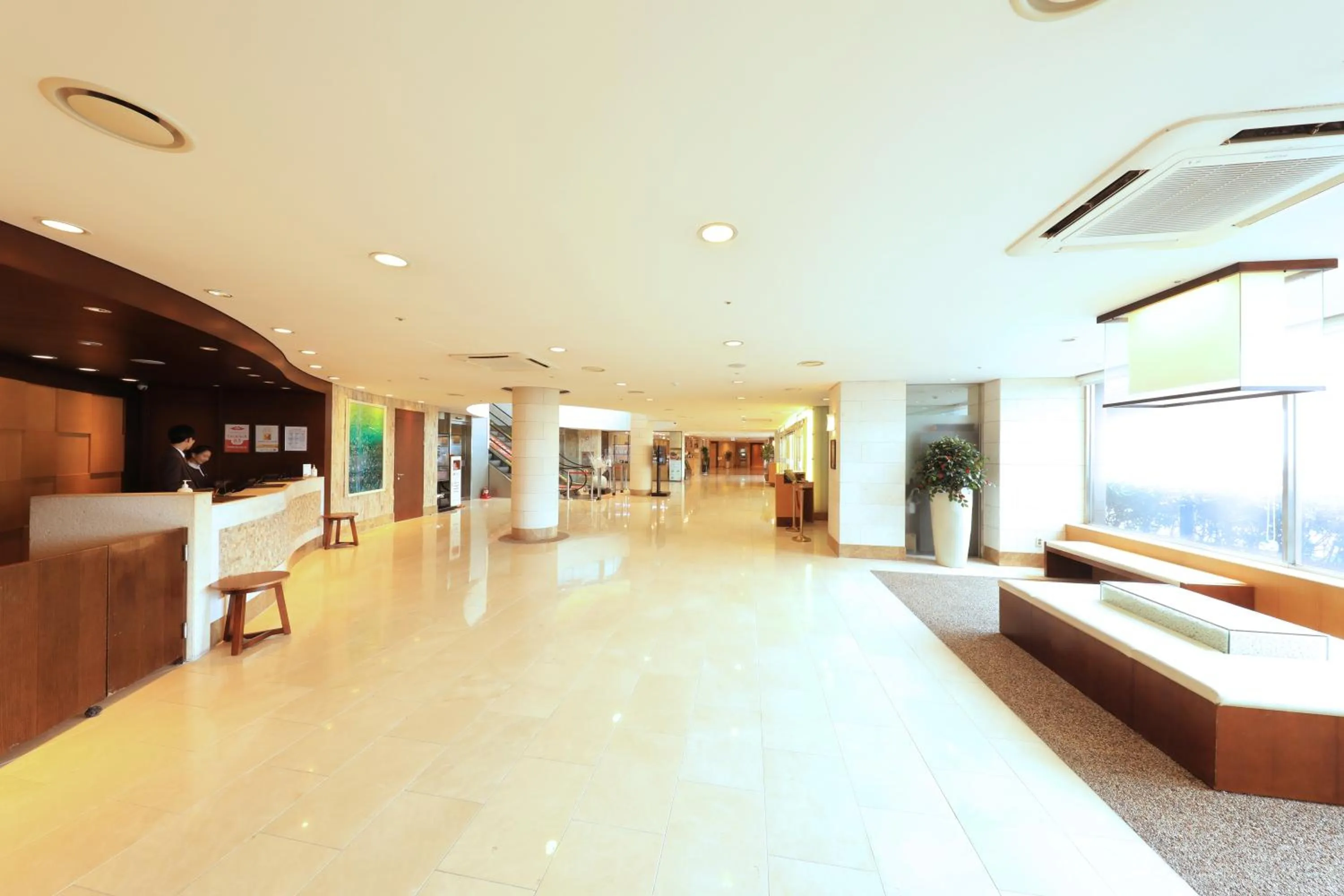 Lobby or reception in Ocean Suites Jeju Hotel