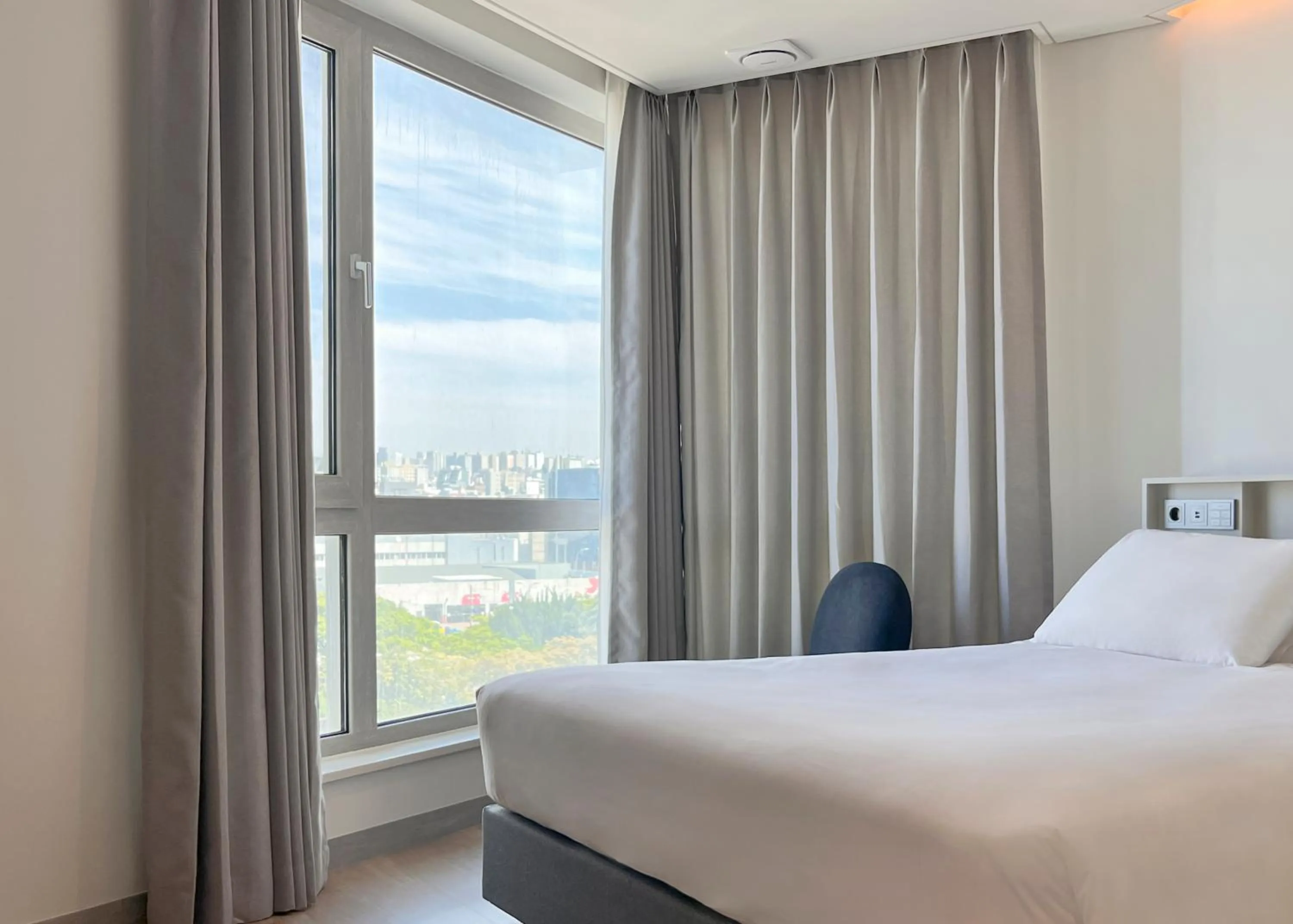 Photo of the whole room, Bed in Ocean Suites Jeju Hotel