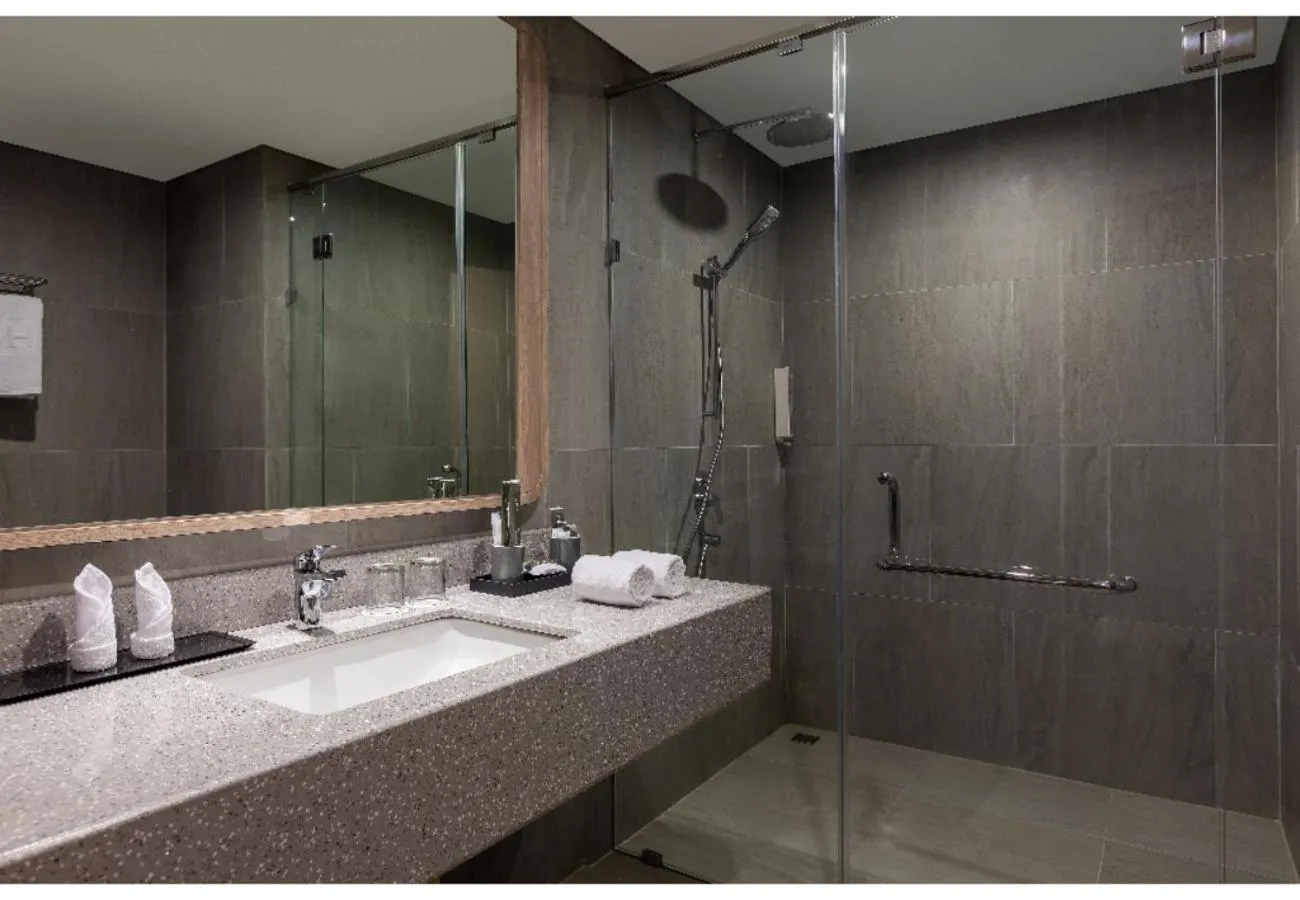 Bathroom in Harper Banjarmasin by ASTON