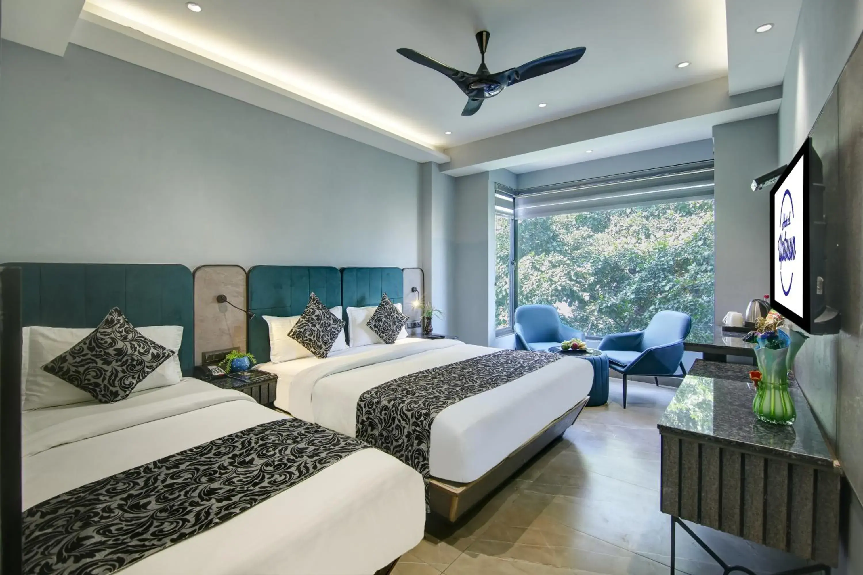 Luxury Family Studio + Window + City View + Free Early Check-In (Subject to Availability) in HOTEL UPTOWN with Luxury Restaurant & Rooftop Near Connaught Place, New Delhi City Centre Luxury Family Studio + Window + City View + Free Early Check-In (Subject to Availability) in HOTEL UPTOWN with Luxury Restaurant & Rooftop Near Connaught Place, New Delhi City Centre