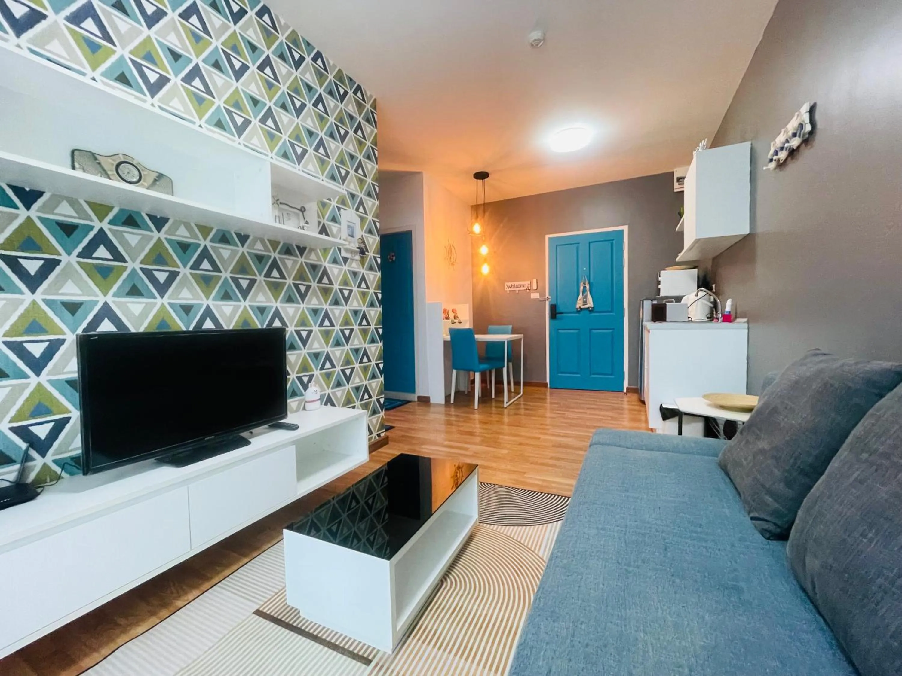 Communal lounge/ TV room in The Trust Condo by the Sea