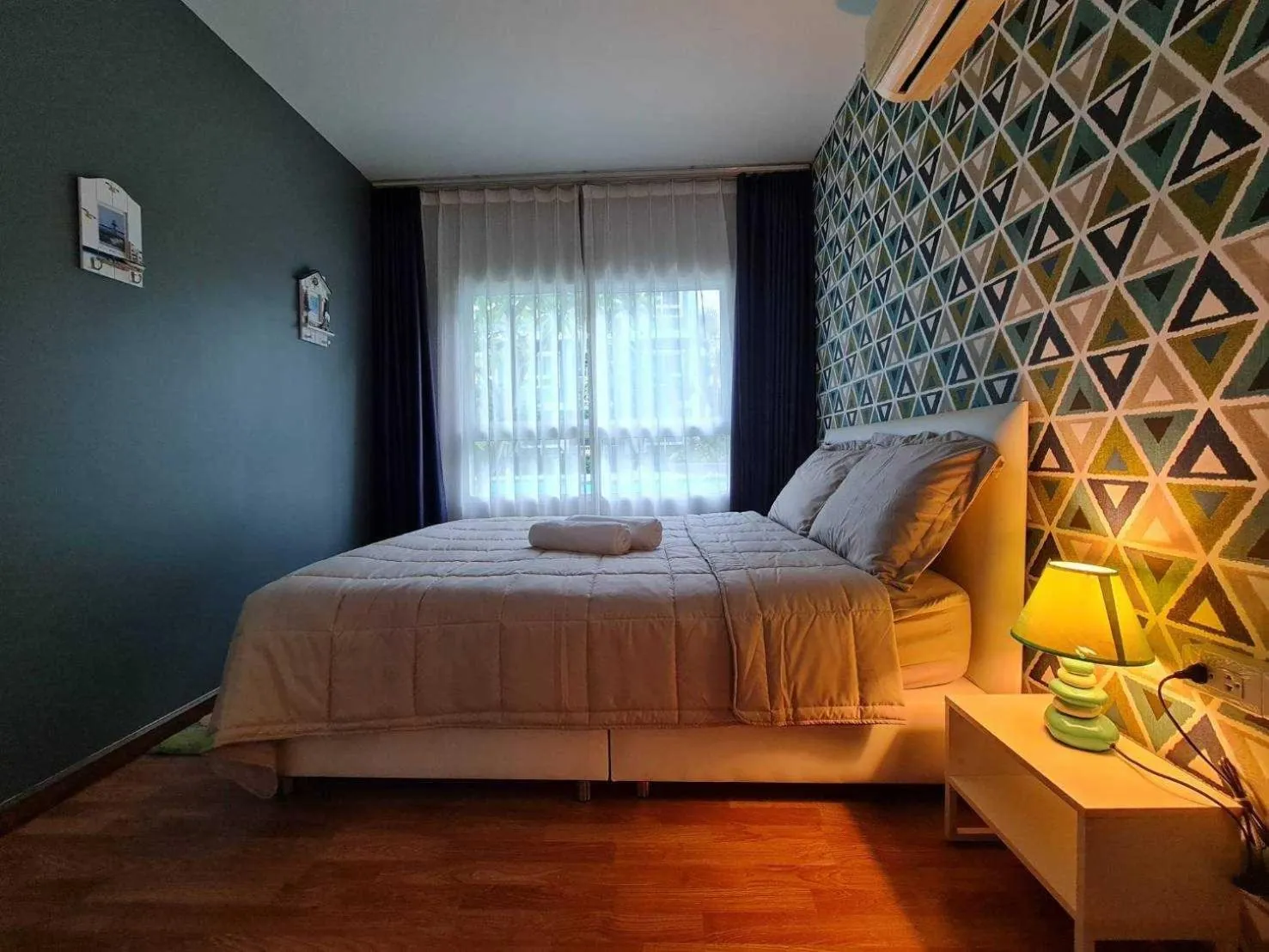 Bed in The Trust Condo by the Sea