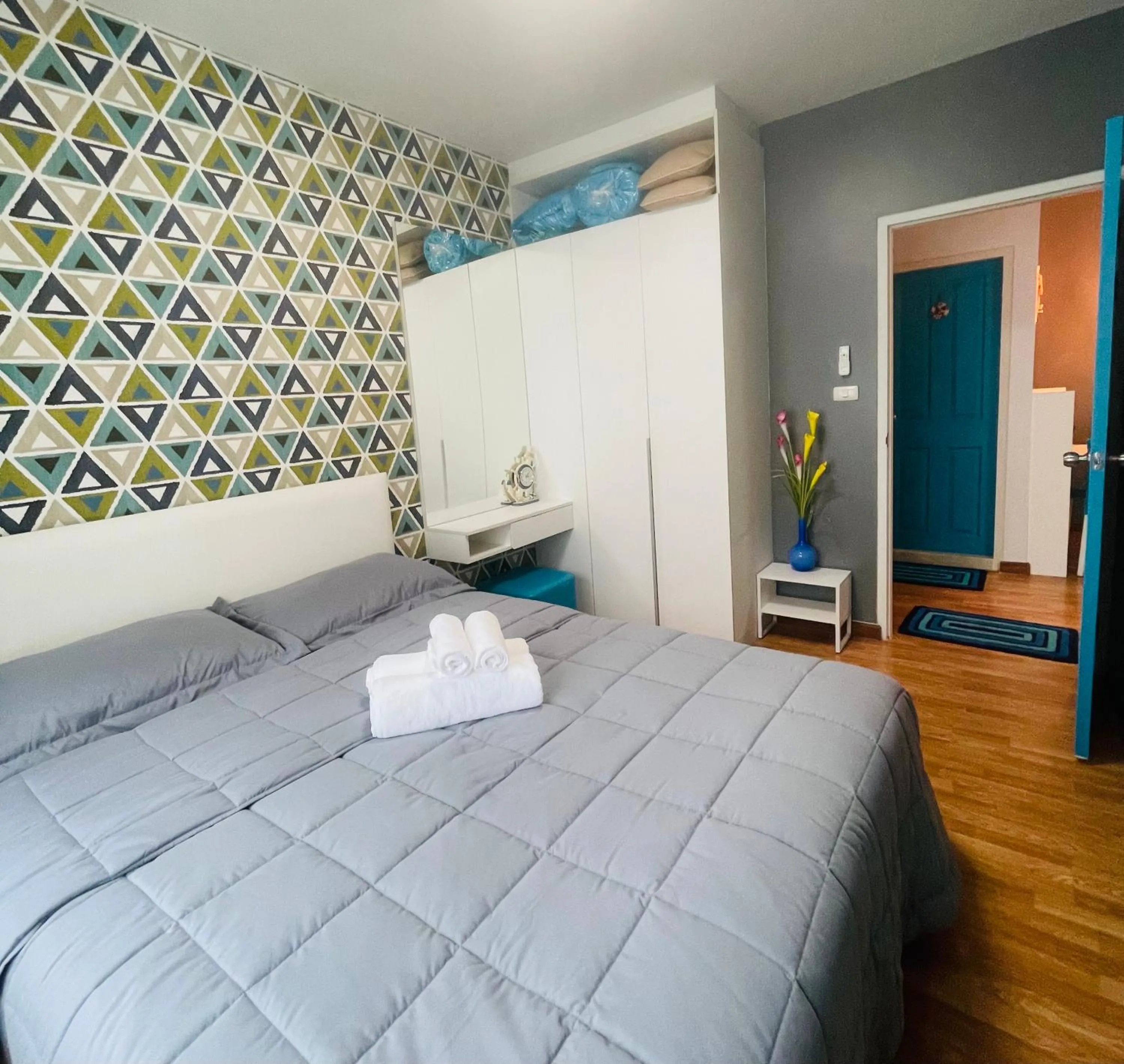 Bed in The Trust Condo by the Sea