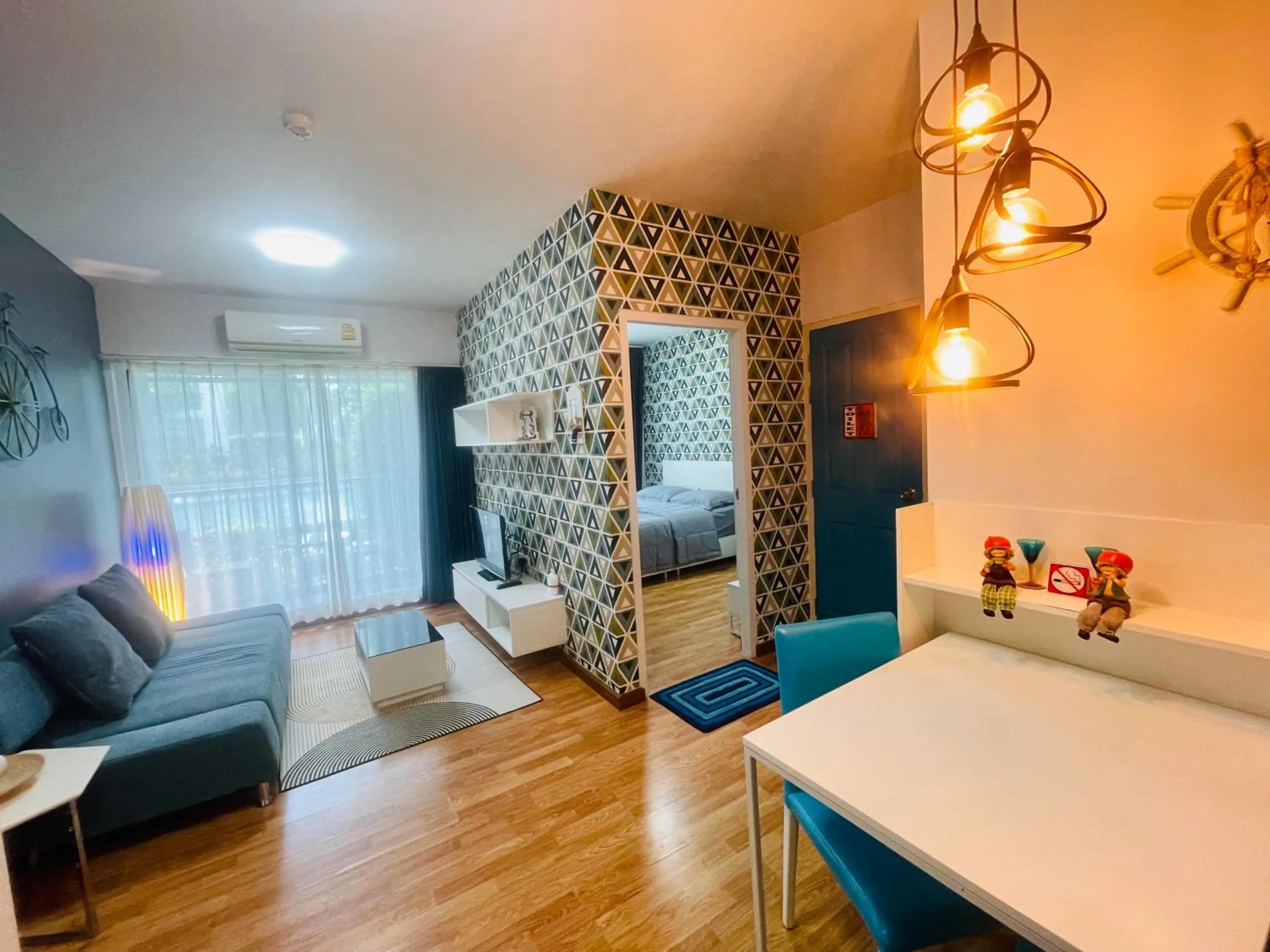 Communal lounge/ TV room in The Trust Condo by the Sea