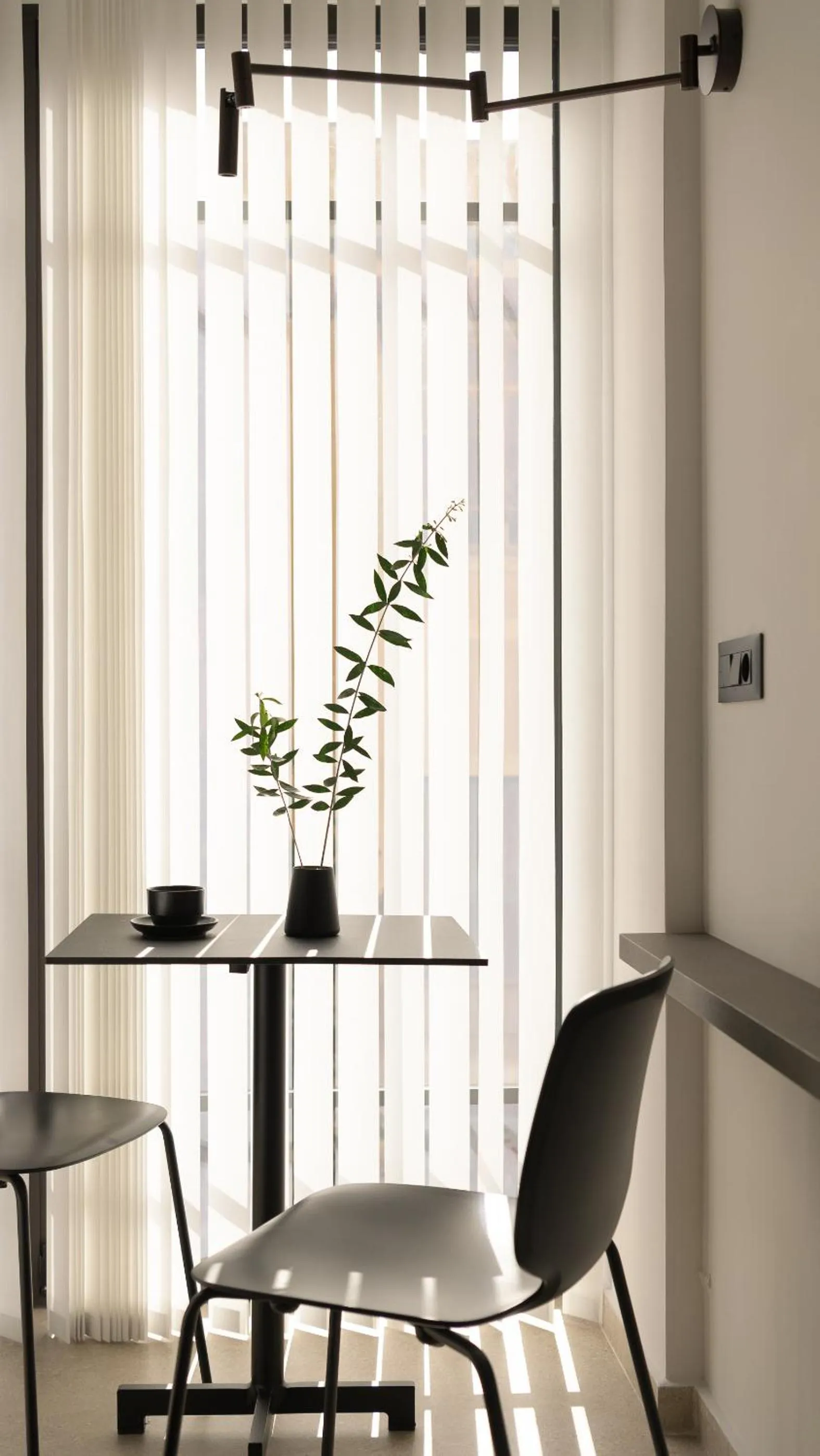 Seating area in Pleiades Urban Stay by Semavί