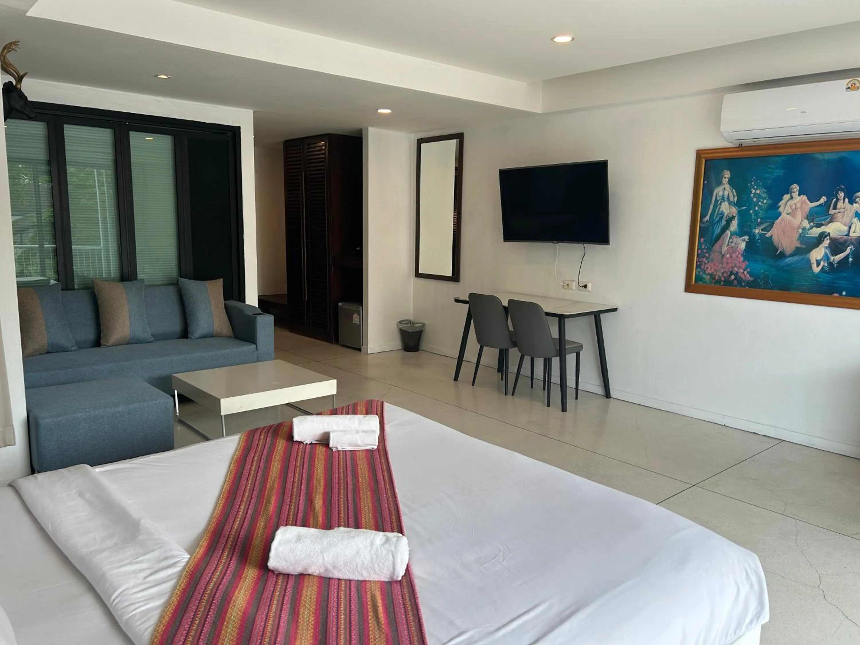 Seating area, Bed in Coco boutique hotel