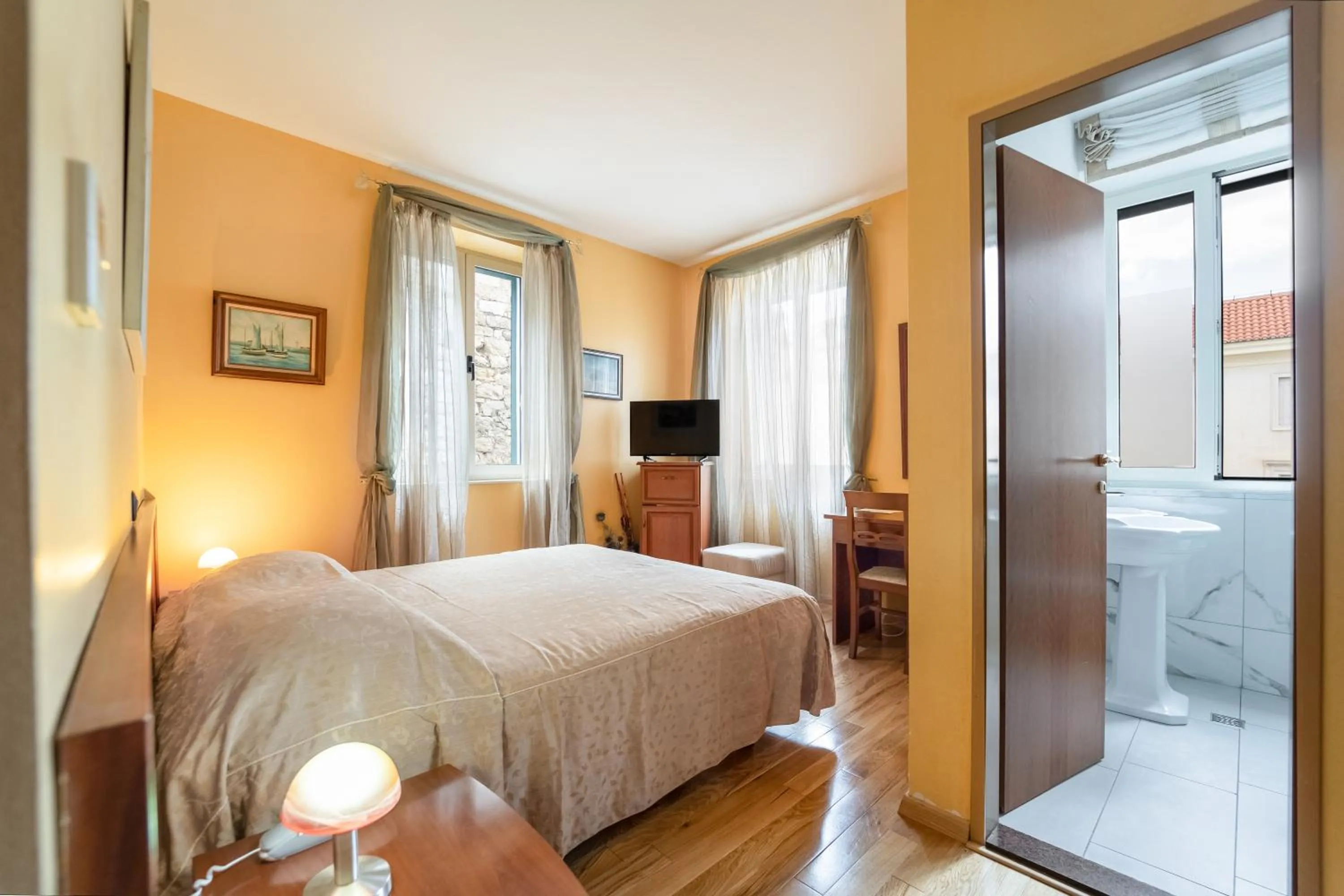 Bed in Hotel Peristil