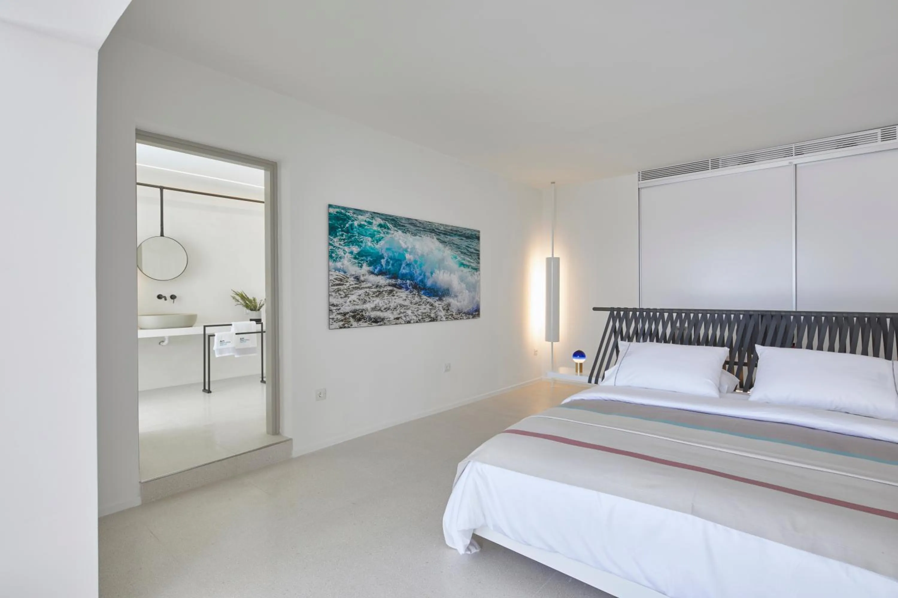 Bed in Alti Santorini Suites - Caldera View