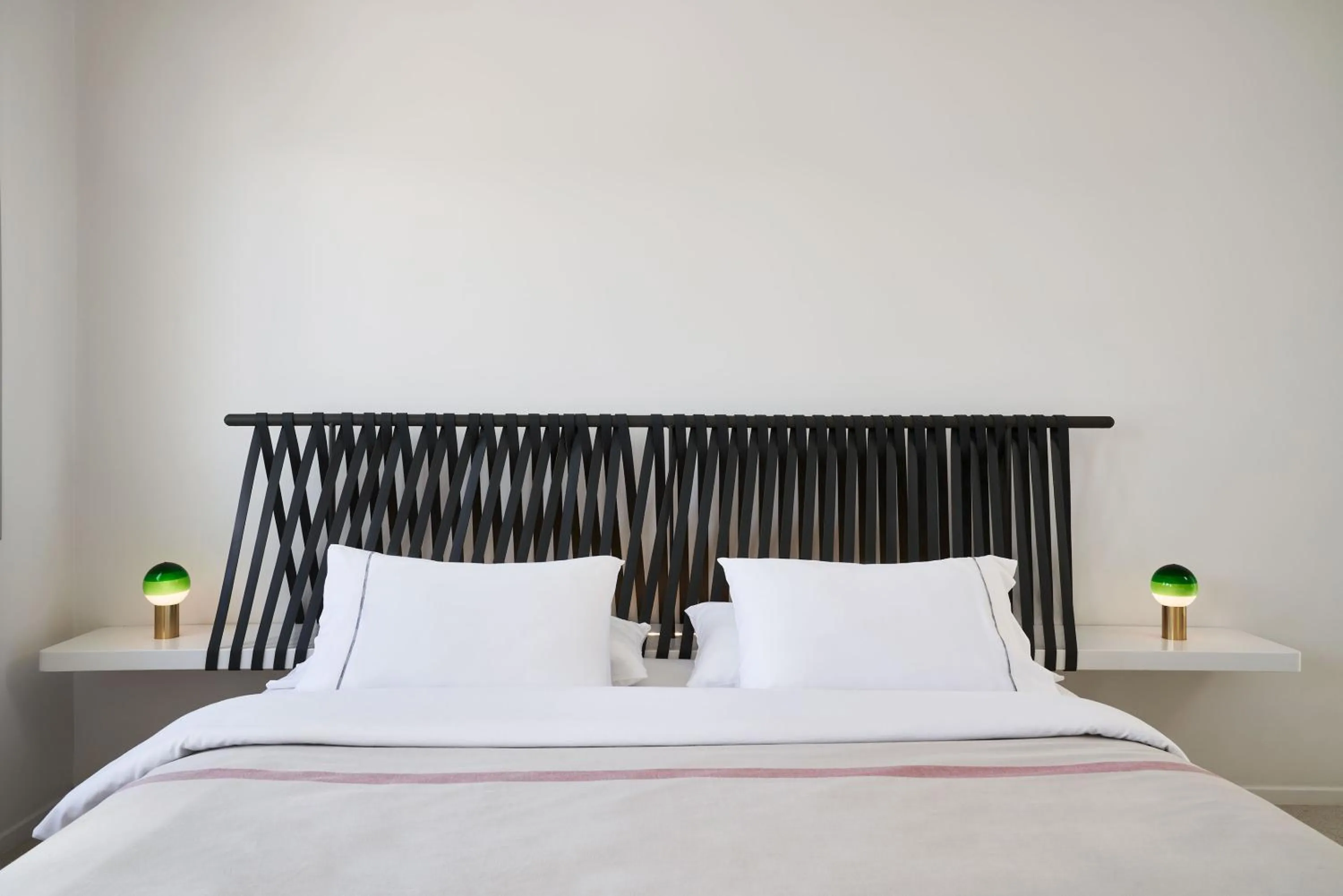 Bed in Alti Santorini Suites - Caldera View