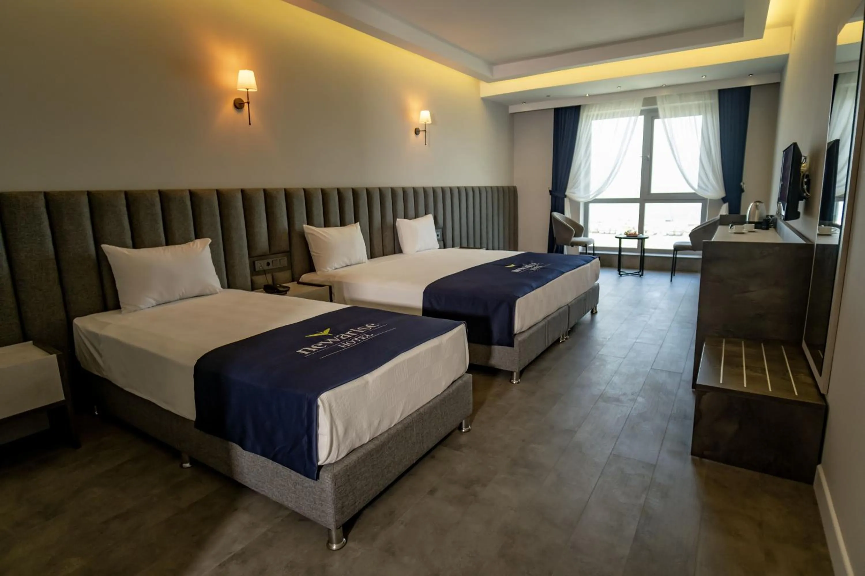 Bed in Newarise Hotel