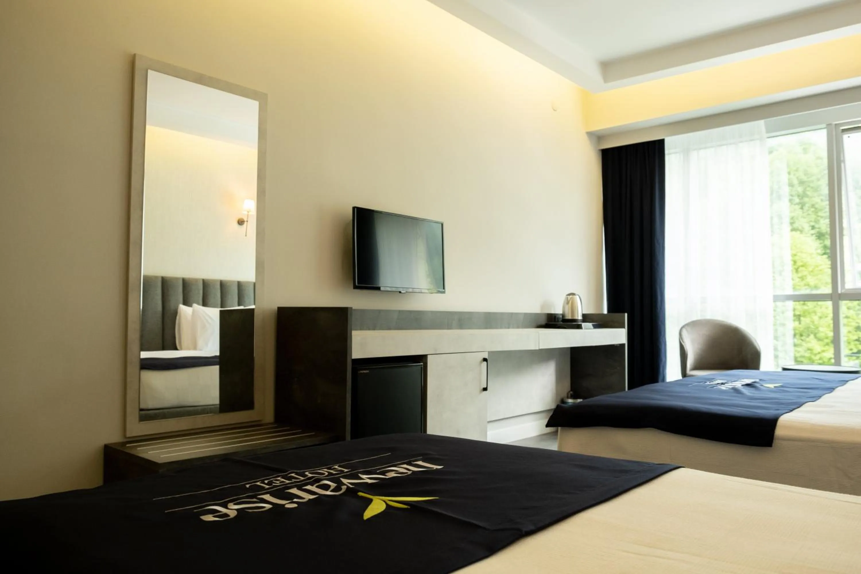 Bed in Newarise Hotel